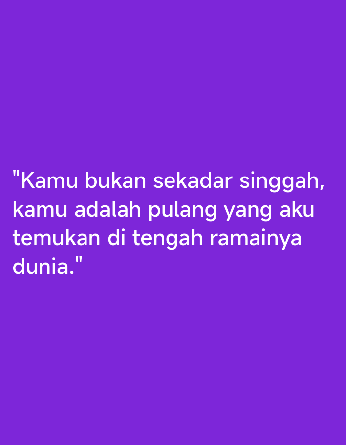 The image displays a plain, vibrant purple background. Centered on the background are several lines of white text in Indonesian, forming a quote. The text reads: "Kamu bukan sekadar singgah, kamu adalah pulang yang aku temukan di tengah ramainya dunia." This translates to "You are not just stopping by, you are the home I found in the middle of a crowded world." There are no objects, people, or environmental features visible in the image. The location in Gantungan, Indonesia, is not discernible from the visual information provided.