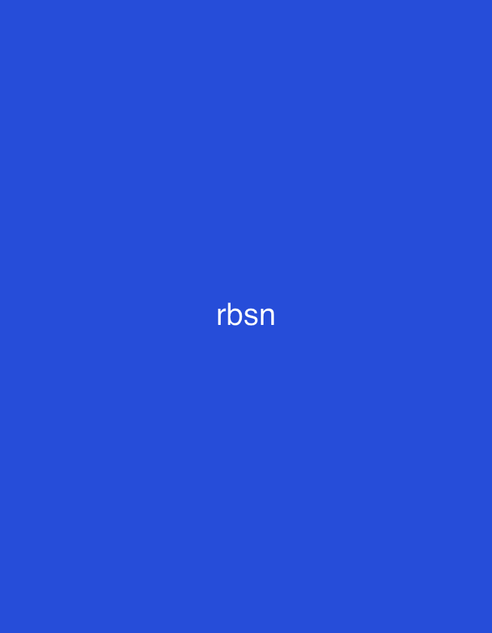 The image displays a solid, uniform field of medium-dark blue, resembling a royal blue hue. Centered horizontally and vertically against this blue background are four white, lowercase, sans-serif letters: "rbsn". There are no discernible subjects, objects, or environmental details beyond the colored field and text. The image provides no visual cues to directly depict the city of Casablanca, Morocco; however, it is presented in the context of that location.
