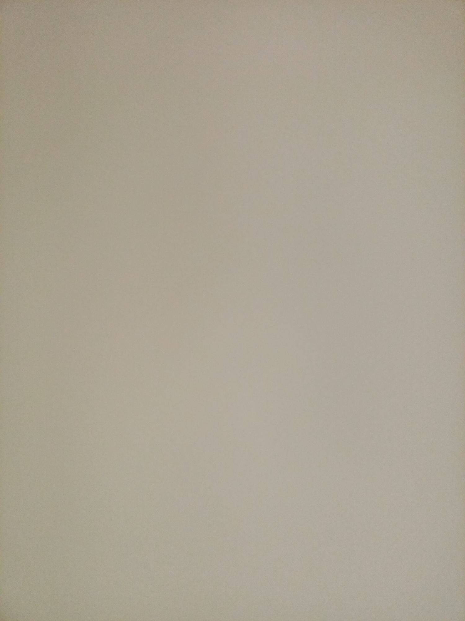 This is an image of a plain, light-colored wall, possibly a painted surface. There are no discernible objects, people, or activities visible. The lighting appears even, suggesting an indoor setting or an overcast day. The texture of the wall is slightly rough, with subtle variations in shade across the surface. Without any contextual clues, it is impossible to determine its specific location within Rostov-on-Don, Russia.