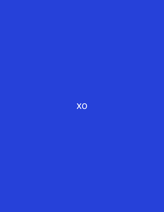 The media file displays a minimalist image with a solid, vibrant blue background. Centered on this uniform blue canvas, the white capital letters "XO" are prominently featured in a sans-serif font. No people, objects, or distinct scenes are visible other than the text and the monochromatic background. There is no activity or event taking place. The image lacks any visual cues that would indicate a specific time of day, weather conditions, or an identifiable location, such as Vagharshapat, Armenia. The composition is clean and abstract, focusing solely on the "XO" text against the blue.