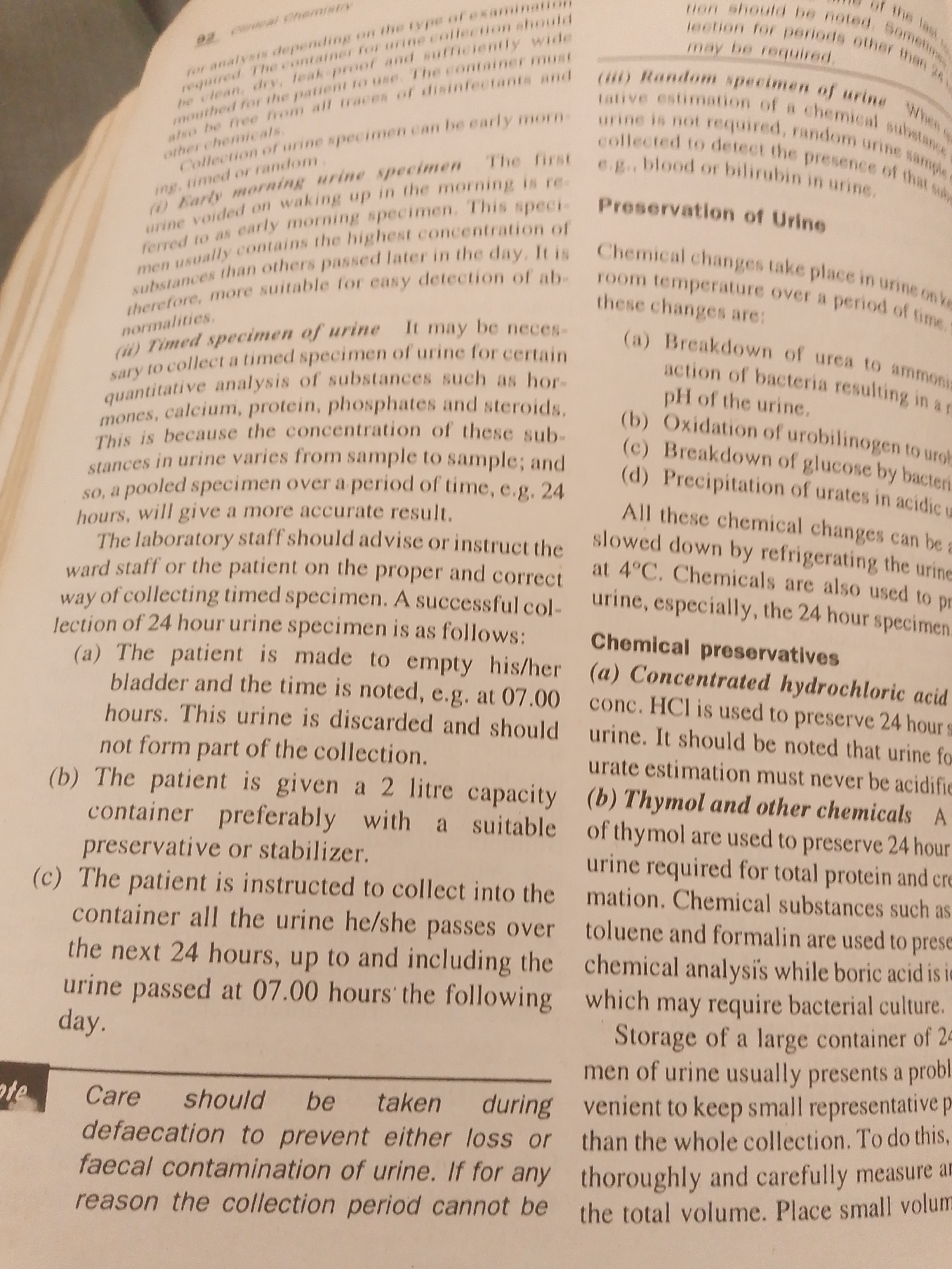 The media file is a close-up photograph of an open book, viewed from a slightly upward angle. The book is open to a page with dense text, suggesting an academic or informational context, likely related to medical or scientific subjects, given the visible headings like "Clinical Chemistry," "Preservation of Urine," and "Chemical preservatives." The page appears to be from a textbook or a reference manual. The lighting suggests an indoor setting, possibly under artificial light or natural light from a window, as there are no clear indicators of time of day or weather. The book itself is the primary object, with no people or other significant objects visible in the frame. The background is out of focus, hinting at a simple, possibly unadorned environment where the book is being read or consulted. The text is primarily in English, with some headings and bullet points indicating a structured layout for information delivery. The visible text discusses various aspects of urine specimen collection and preservation, including different types of specimens (early morning, timed, random), the process of collecting a 24-hour urine sample, and the chemical changes that occur in urine, as well as methods of preservation using chemicals like hydrochloric acid and thymol. The overall tone of the text is formal and instructional. There are no visible location cues within the image itself to suggest Jalingo, Nigeria.