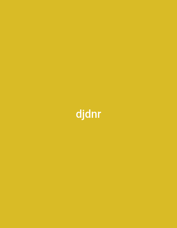 The image displays a solid, uniform mustard yellow background. Centered on this monochromatic field is the word "djdnr," rendered in a white, sans-serif font in lowercase letters. There are no discernible people, objects, or activities depicted. The scene is abstract and minimalist, offering no visual cues regarding time of day, weather, or specific environmental details. The provided location context of Yerevan, Armenia, is not visually supported or indicated by any element within the image itself. The focus is entirely on the simple text against the colored backdrop.