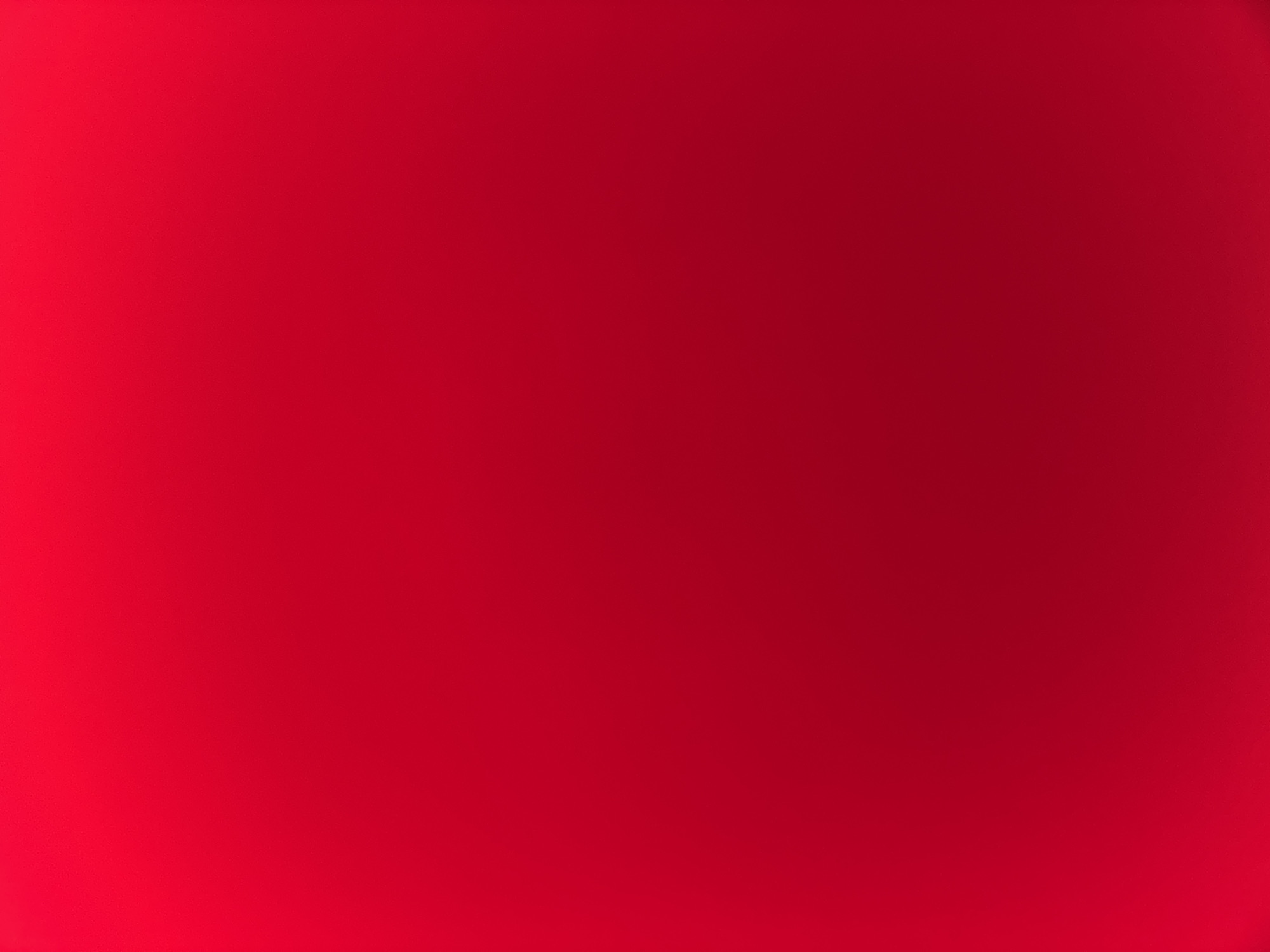 The image is a solid red color. There is no indication of location, people, objects, actions, or interactions.