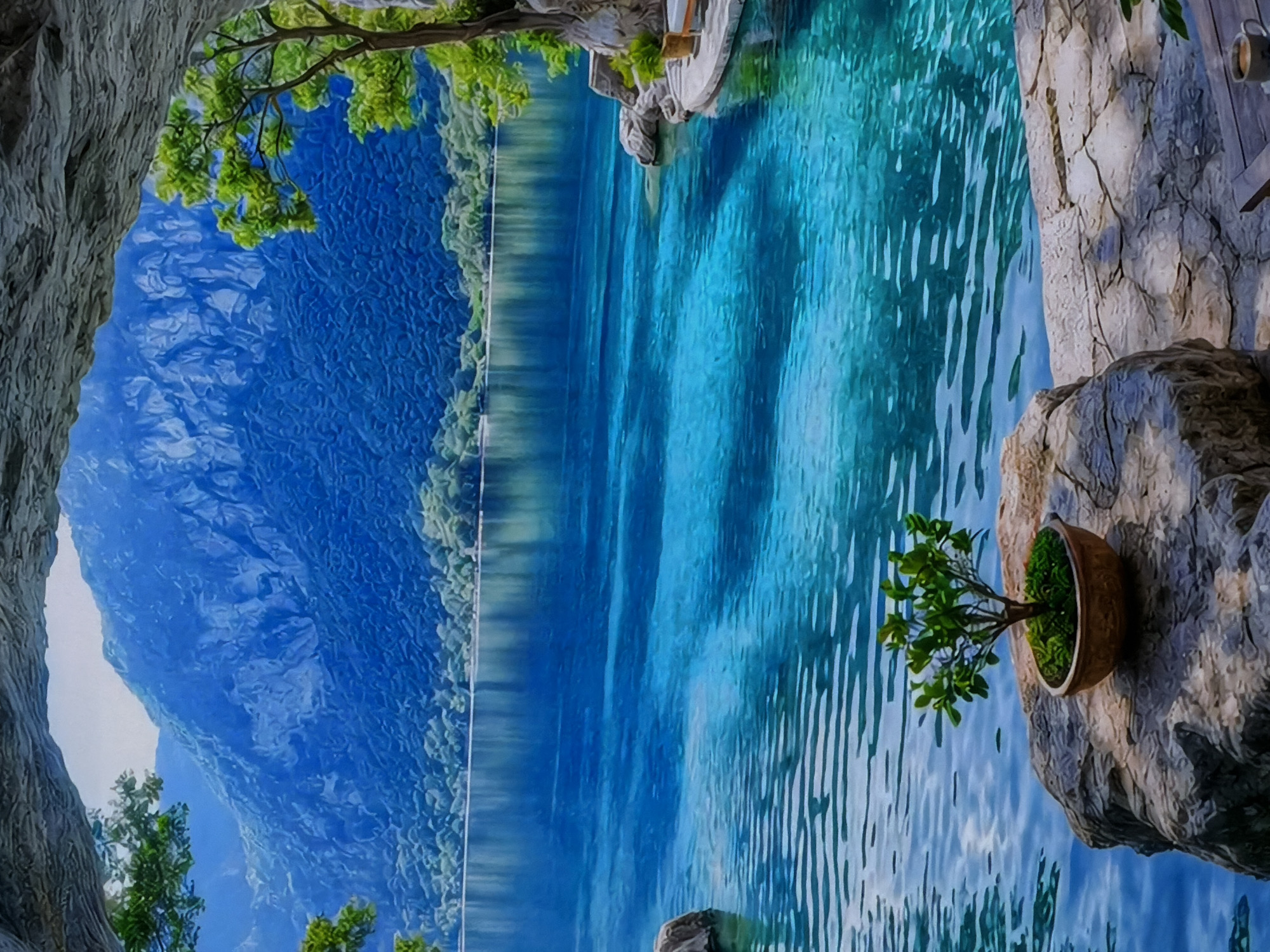This vibrant and serene landscape image, appearing to be a digital painting or heavily processed photograph, depicts a crystal-clear lake surrounded by majestic mountains. The scene is viewed through a natural archway or opening formed by textured rock formations and lush foliage in the immediate foreground.
On the left side of the frame, a large, textured tree trunk or rock structure extends from the top, with green leafy branches overhanging and framing the expansive view. The central and largest part of the image is dominated by the extraordinarily clear water of a lake, which displays stunning shades of turquoise and deep blue. Gentle ripples are visible across the water's surface, reflecting the light and adding texture. The water is so transparent that faint patterns, possibly indicating depth or underwater features, can be discerned beneath the surface.
Across the distant shore, a dense band of green trees and vegetation lines the edge of the lake. Behind this greenery, majestic blue-tinged mountains rise dramatically into the sky, their rugged peaks partially reflecting in the calm waters.
On the right side of the frame, a light-colored rocky cliff face adds another element to the composition. Perched on a ledge of this cliff is a small, brown potted plant with vibrant green foliage. Further along this cliff, closer to the viewer and slightly elevated, a small wooden platform with a circular base and what appears to be a white mug suggests a small, secluded vantage point or resting area.
The overall impression is one of peaceful natural beauty under clear daylight conditions, evoking feelings of tranquility and wonder. No specific activity is taking place, and there is no visible text. The location context for this idyllic scene is Sofiivska Borshchahivka, Ukraine.