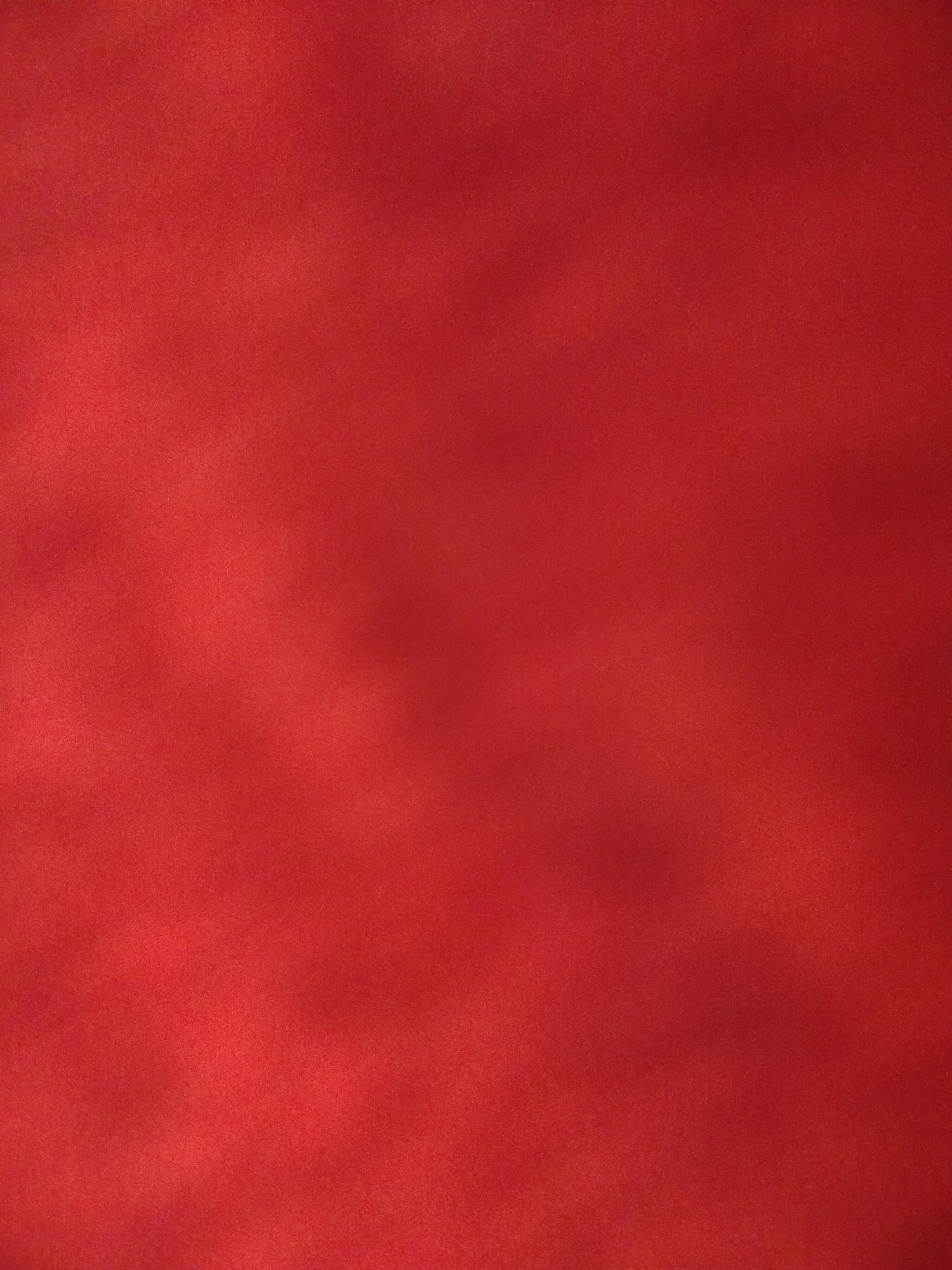 The image shows a red, textured surface. There are no people, objects, or identifiable environmental details to suggest a location in Yerevan, Armenia, or anywhere else. The image appears to be a close-up of a solid color material.