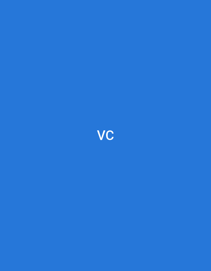 The image features a solid blue background. Centered within the frame are the lowercase letters "vc" rendered in white, sans-serif text. There are no other objects, individuals, or environmental details visible in the image. The scene is devoid of any discernible actions or interactions. The image provides no information about a specific geographical location.