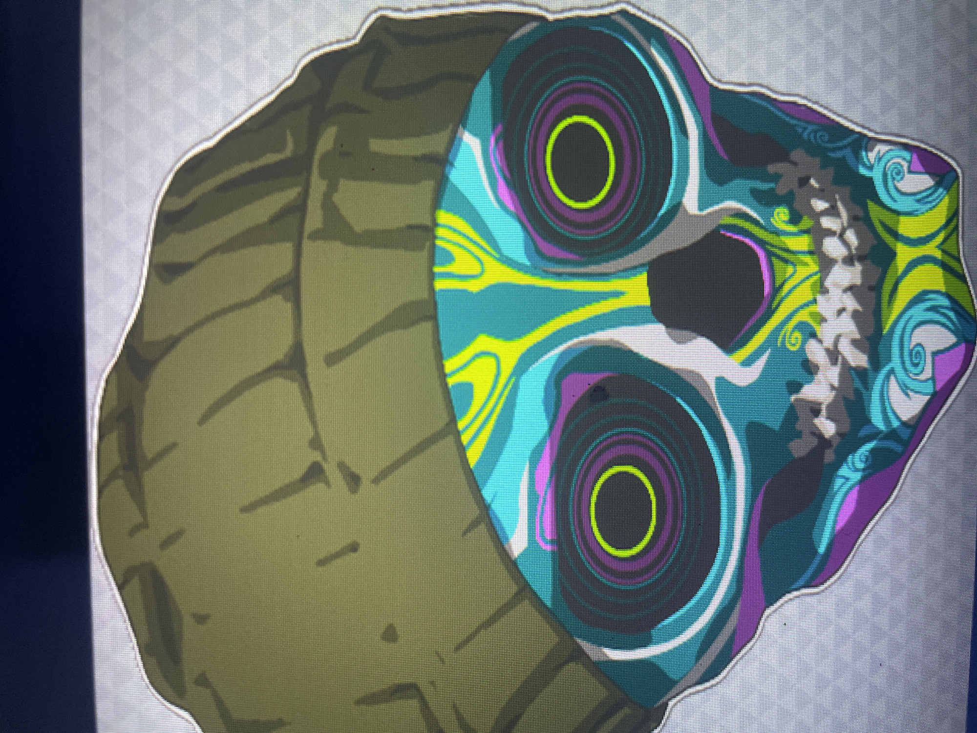 The image shows a digital illustration of a skull with a knitted cap. The skull is adorned with vibrant colors and intricate patterns, featuring swirling lines and floral motifs in shades of teal, purple, yellow, and white. The cap is a solid olive green color. The background is a light gray with a subtle geometric pattern. The illustration is presented in a close-up view, focusing on the details of the skull and cap. There are no people, actions, or interactions depicted in the image. The location in the city of Kołobrzeg, Poland, is not identifiable from the image itself.
