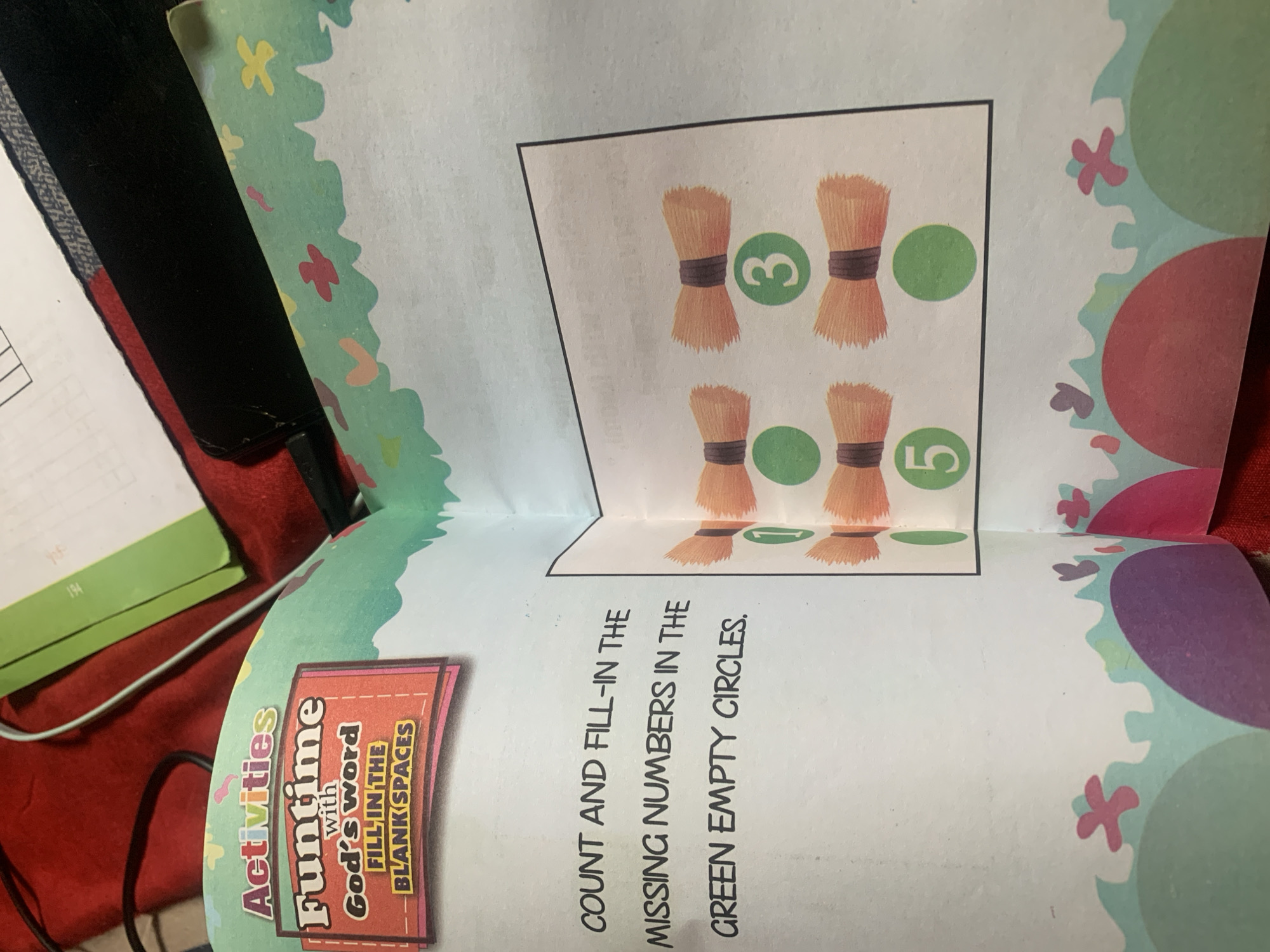 The image shows a page from a children's activity book with a lesson on counting. The page is titled "Funtime with God's word" and instructs the reader to "COUNT AND FILL-IN THE MISSING NUMBERS IN THE GREEN EMPTY CIRCLES." The right side of the page features a diagram with rows of illustrated bundles of wheat. Each row contains either a numbered green circle or an empty green circle. The first row shows a bundle of wheat above an empty green circle. The second row shows a bundle of wheat above the number "1". The third row shows a bundle of wheat above an empty green circle. The fourth row shows a bundle of wheat above the number "3". The fifth row shows a bundle of wheat above an empty green circle. The sixth row shows a bundle of wheat above the number "5". The overall theme appears to be a counting exercise using visual aids. The location of Jauro Yinu, Nigeria is not depicted or relevant to the content of this image.