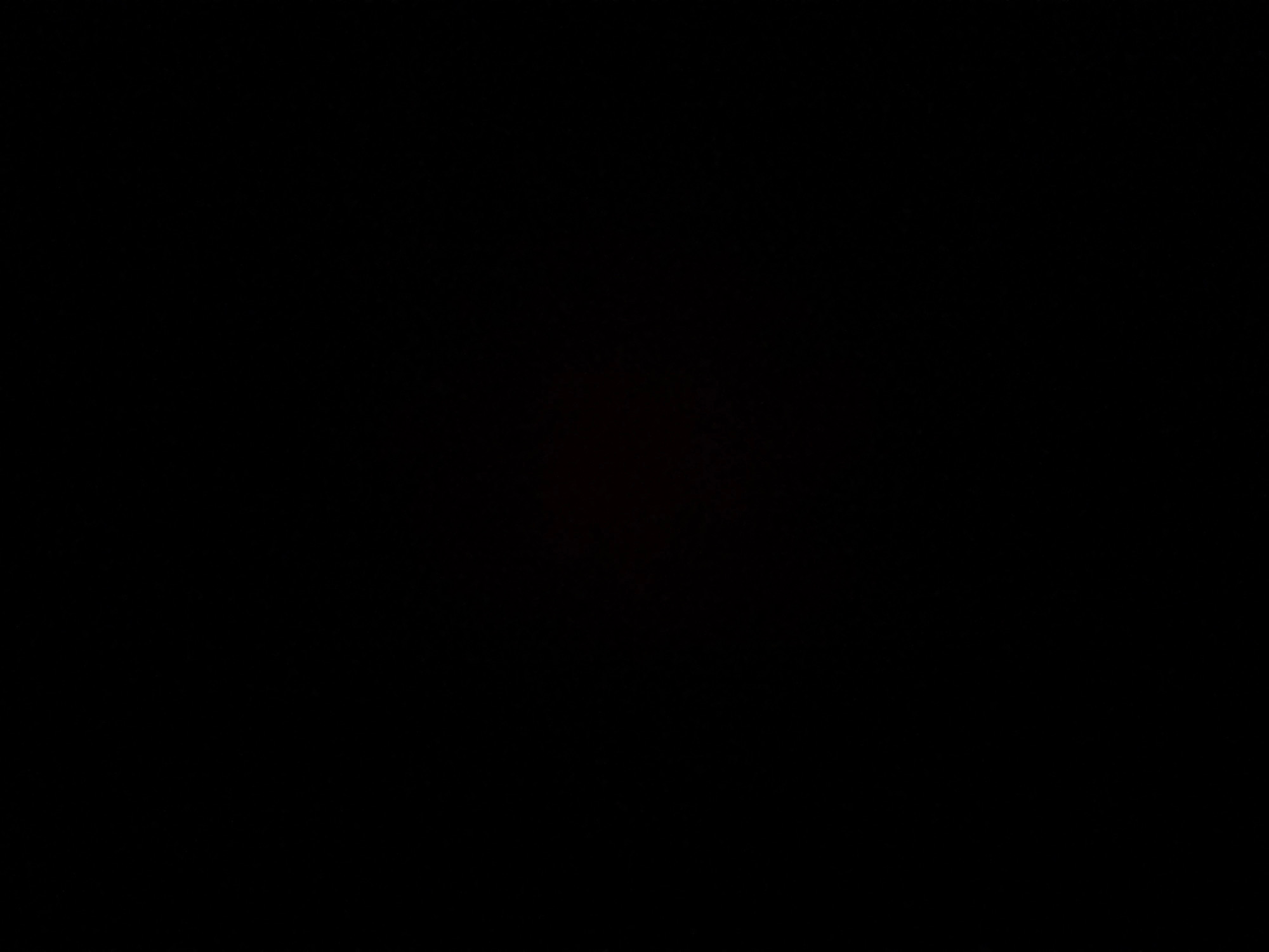The image provided is entirely black, offering no visual information to describe. Therefore, it is impossible to provide any details about a scene, location in Ko Samui District, Thailand, or any subjects, objects, actions, or interactions within it.