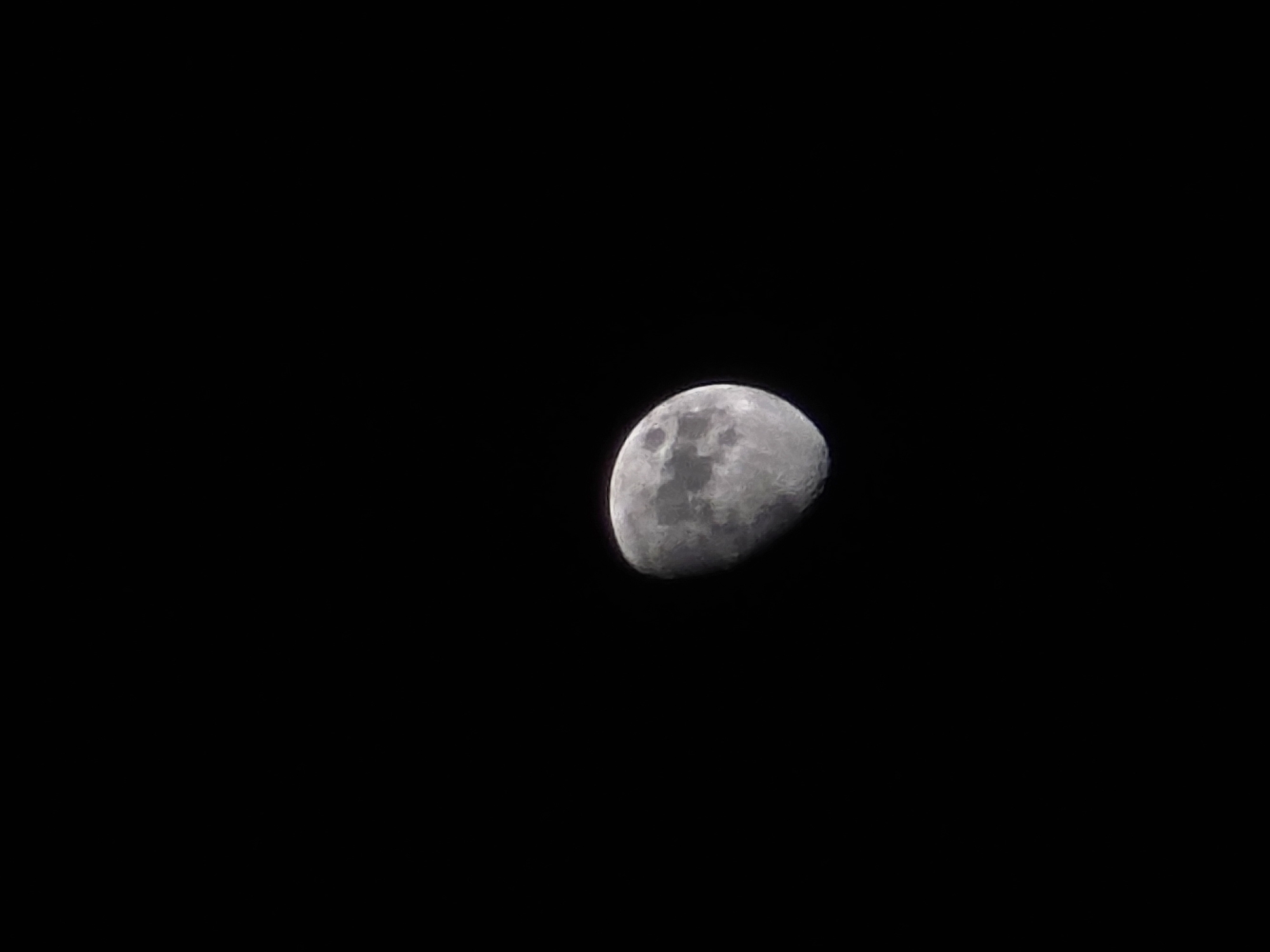 A photograph shows the moon, appearing as a waning gibbous phase, against a black sky. There are no other objects or subjects present in the image. The exact location and time of the photo were not specified, so the specific location in the city of Sofia, Bulgaria, cannot be determined.