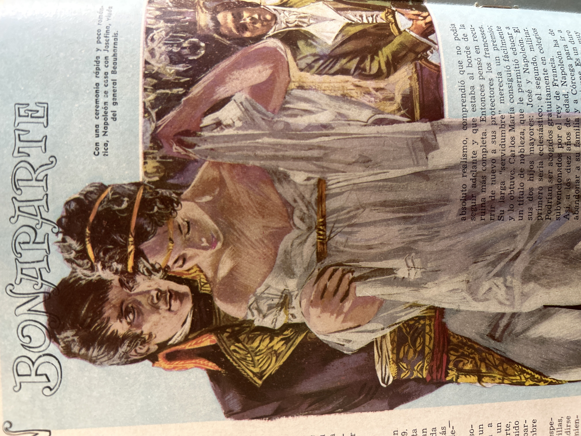 The image is a close-up of a historical illustration depicting Napoleon Bonaparte and Josephine Beauharnais. Napoleon, dressed in a military uniform with gold epaulets and a red collar, stands behind Josephine, holding her as she adjusts her light-colored dress. Josephine wears a gold headband. To the right, another man in a green jacket and white cravat is partially visible. The background features a subtle park or garden scene with trees. The illustration is accompanied by Spanish text. The location of Santa Ana, Venezuela is not depicted in this image; it is a historical illustration and the text suggests a European context related to Napoleon.