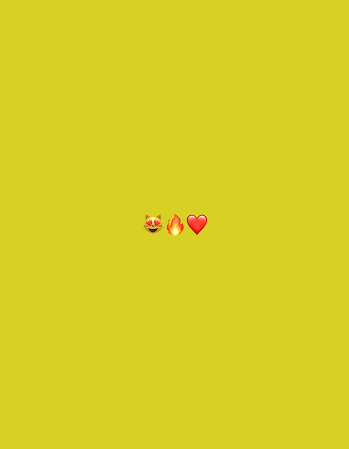The image is a plain yellow background with three emojis centered horizontally. From left to right, the emojis are a cat face with heart-shaped eyes, a flame, and a red heart. There is no indication of the city of Rusanovo, Russia, in the image.