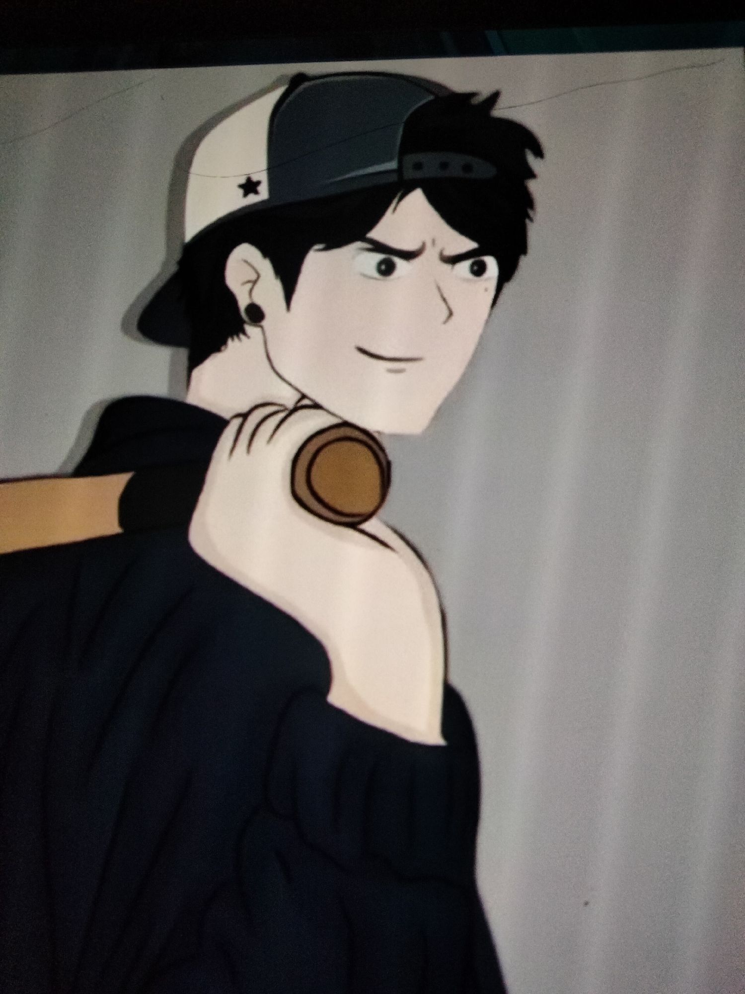 The image is a digitally rendered illustration of an anime-style character. The character is a young male with black hair, wearing a baseball cap with a white front and a dark brim and back. The cap has a black star on the front. He has dark, narrowed eyes and a slight smirk on his face. He is wearing a dark hoodie and has a baseball bat resting on his right shoulder, held by his right hand. The background is a plain, light gray wall. The illustration is focused on the character's upper body and head. There is no indication of the city of Payagaboh, Indonesia, in this image.