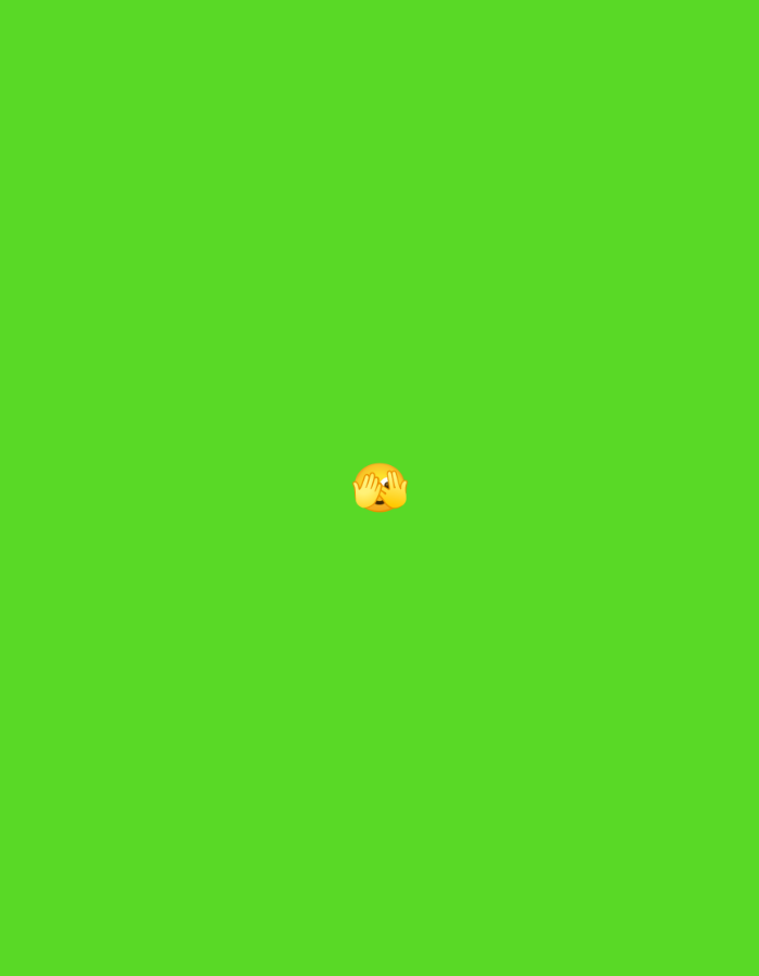 The image depicts a green screen background with a single emoji in the center. The emoji is a yellow face with its hands covering its eyes, indicating a feeling of embarrassment or shyness. There are no other objects or people visible in the image. The location in Jenu, Indonesia is not specified and cannot be determined from the provided image.