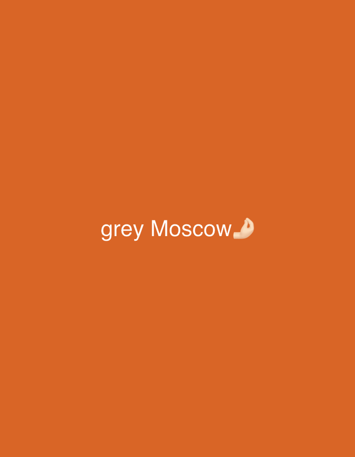 The image shows the text "grey Moscow" with a hand emoji to the right, on a solid orange background. There is no depiction of the city of Moscow or any other discernible location.