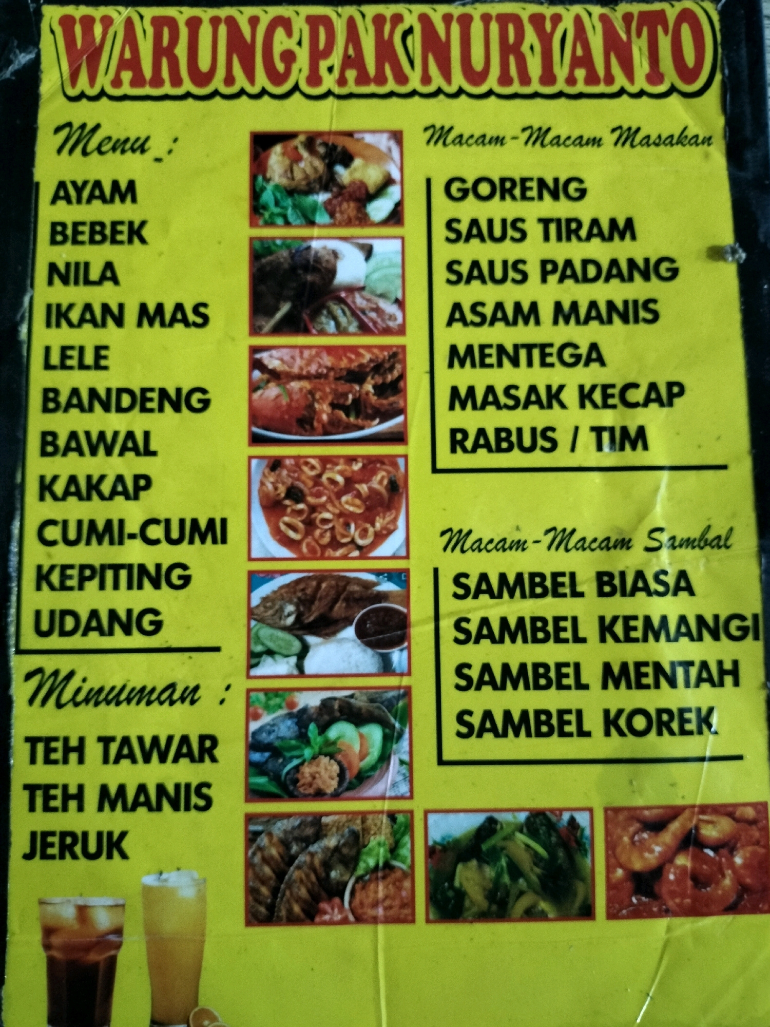 The image is a photograph of a yellow menu board from "WARUNG PAKNURYANTO" in Banjarmasin, Indonesia. The menu board is divided into sections: "Menu," "Macam-Macam Masakan" (Assorted Dishes), and "Macam-Macam Sambal" (Assorted Sambals), and "Minuman" (Drinks). The "Menu" section lists various seafood and poultry items such as AYAM (chicken), BEBEK (duck), NILA (tilapia), IKAN MAS (carp), LELE (catfish), BANDENG (milkfish), BAWAL (pomfret), KAKAP (snapper), CUMI-CUMI (squid), KEPITING (crab), and UDANG (shrimp). The "Macam-Macam Masakan" section lists cooking styles including GORENG (fried), SAUS TIRAM (oyster sauce), SAUS PADANG (Padang sauce), ASAM MANIS (sweet and sour), MENTEGA (butter), MASAK KECAP (soy sauce cooked), and RABUS / TIM (boiled/steamed). The "Macam-Macam Sambal" section lists SAMBEL BIASA (regular sambal), SAMBEL KEMANGI (basil sambal), SAMBEL MENTAH (raw sambal), and SAMBEL KOREK (korek sambal). The "Minuman" section lists TEH TAWAR (plain tea), TEH MANIS (sweet tea), and JERUK (orange/lime juice). Scattered images of the food items are displayed next to their respective categories. Two glasses of drinks, one dark and one light yellow, are placed at the bottom of the menu. The menu board is likely displayed at an outdoor food stall or a small restaurant, typical of street food vendors in Banjarmasin.
