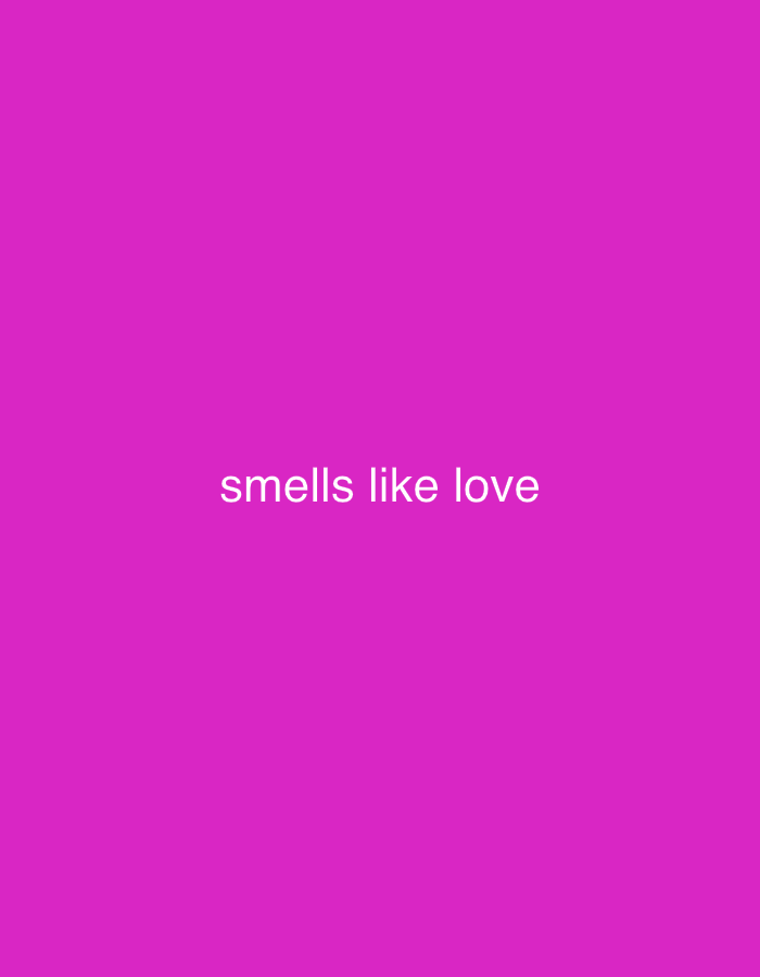 The image is a pink background with the text "smells like love" in white, centered horizontally and vertically. There is no indication of a location, including Novi Sad, Serbia.