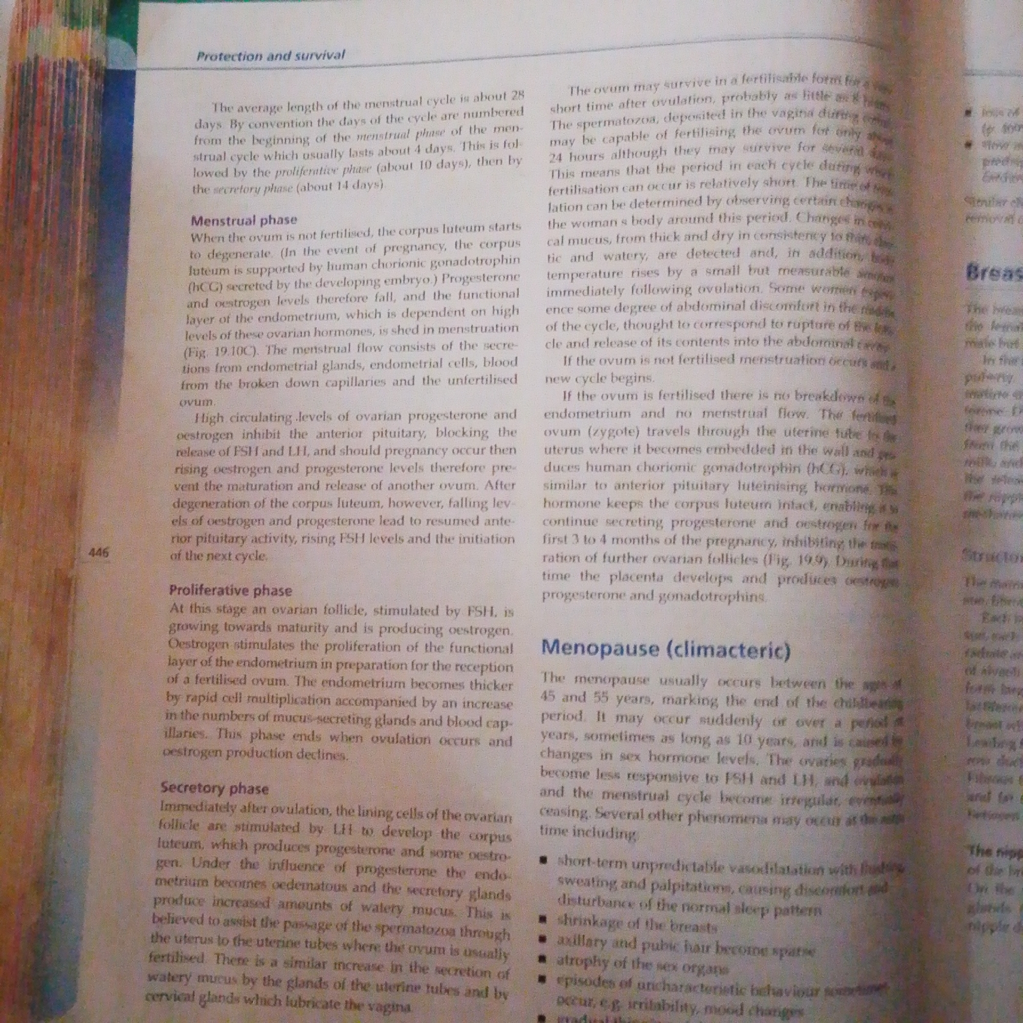 This is a photograph of a page from a biology textbook. The page discusses the menstrual cycle and related biological processes. The text is printed in black ink on white paper. The page is oriented vertically and is from a larger book. There is no information about the city of Jalingo, Nigeria, or any indication that the image is related to that location. The image focuses on detailed biological explanations.