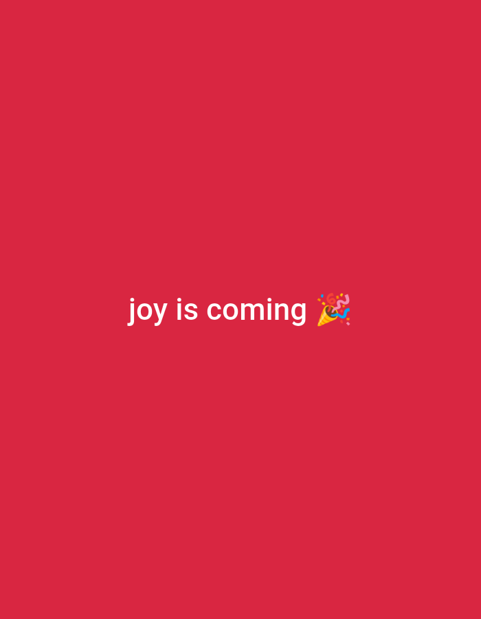 The image is a screenshot of a social media post against a solid red background. White text in the center of the image reads "joy is coming." To the right of the text is a party popper emoji with confetti.
