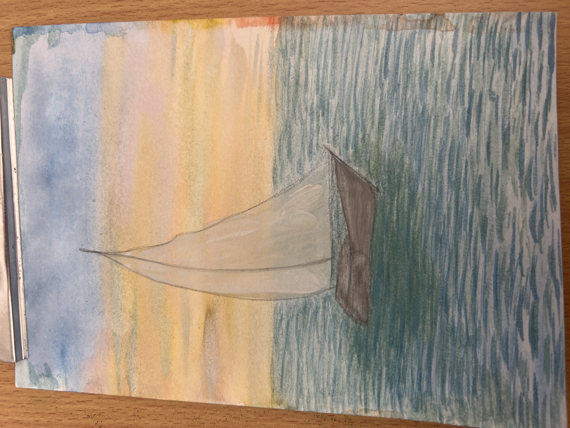 A watercolor painting depicts a sailboat on water. The left side of the painting has a blue and yellow sky. The water transitions from a yellow hue near the sky to a green hue. The sailboat is in the middle, primarily white and a dark gray at the stern.