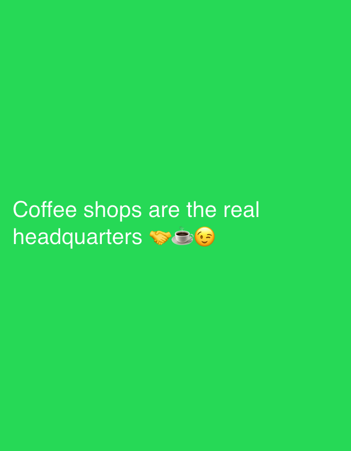 The image displays white text against a solid, vibrant green digital background. In the lower-left quadrant, the phrase "Coffee shops are the real headquarters" is presented in a sans-serif font. Immediately following the text are three emojis: a handshake (π€), a coffee cup (β), and a winking face (π). The scene is purely graphical; no physical environment, people, or discernible objects other than the text and emojis are present. No specific location within the city of Dubai, United Arab Emirates, or any other geographical context is depicted or identifiable from the image content.