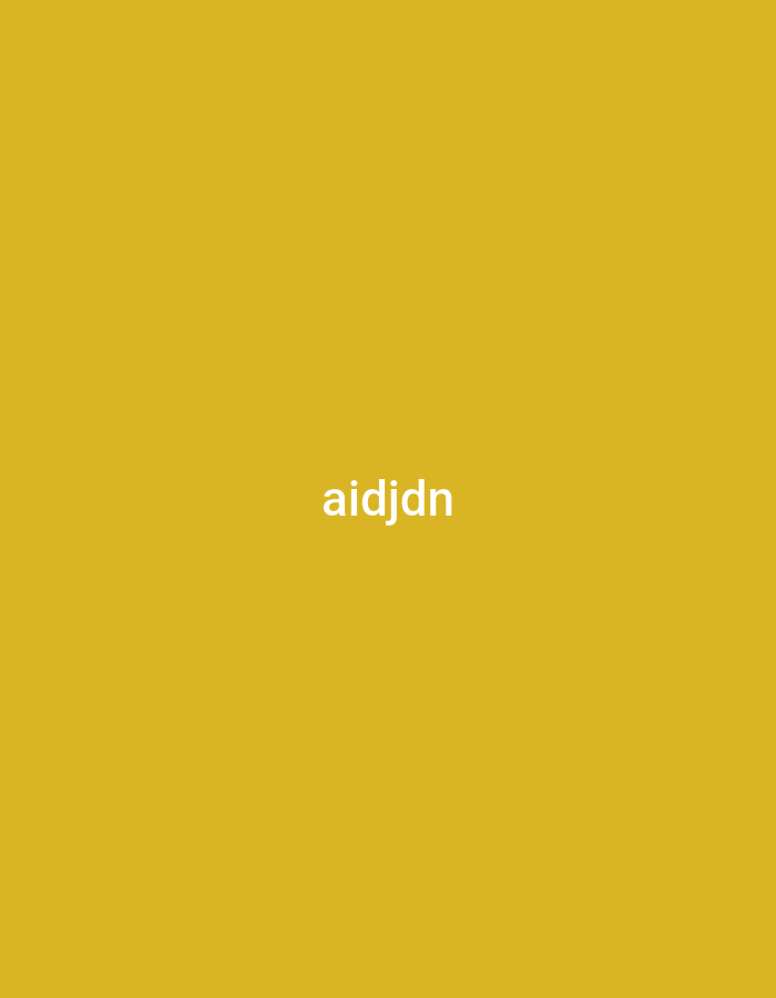 The image is a solid yellow background with white text that reads "aidjdn" centered horizontally and slightly above the vertical center of the image. There are no people, objects, actions, interactions, or environmental details depicted in the image. The location in Jalingo, Nigeria, is not discernible from the provided image.