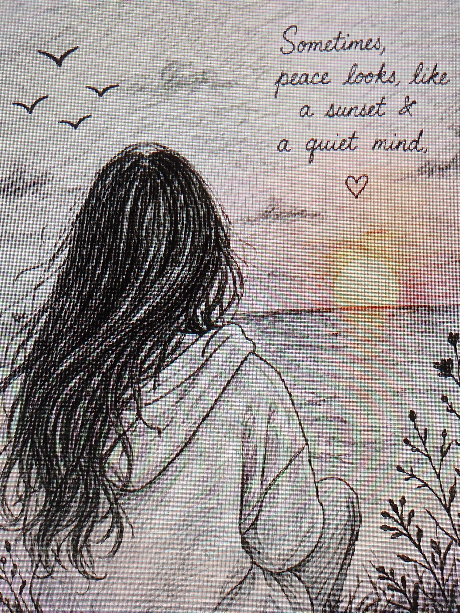 A drawing depicts a person with long, dark hair, wearing a hooded sweatshirt, sitting and facing a sunset over the ocean. In the sky above the person's head, there are four birds. To the right of the person, there are branches and leaves. The image also includes the phrase "Sometimes, peace looks like a sunset & a quiet mind" written in cursive, with a small heart drawn below it. The location is an unidentified seaside location.