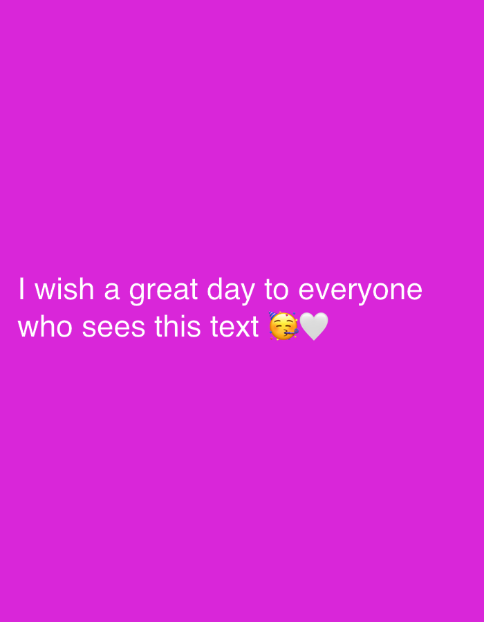 The image displays white text on a vibrant purple background. The text reads, "I wish a great day to everyone who sees this text" followed by two emojis: a face with a party hat blowing a kiss and a white heart. There are no discernible elements related to the city of Sirius, Russia, or any other specific geographic location. The scene is entirely digital or graphic in nature.