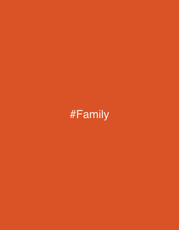 The image is a solid, orange-toned background with the word "#Family" centered in white text. There is no indication of location or presence of people, subjects, objects, actions, or interactions. It is a simple graphic design.