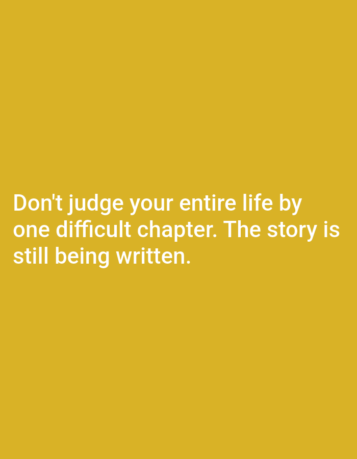 The image is a plain yellow background with white text. The text reads: "Don't judge your entire life by one difficult chapter. The story is still being written." There are no people, objects, or environmental details visible in the image. The location of Алмалыбақ, Kazakhstan, is not depicted or suggested by any element within the image.