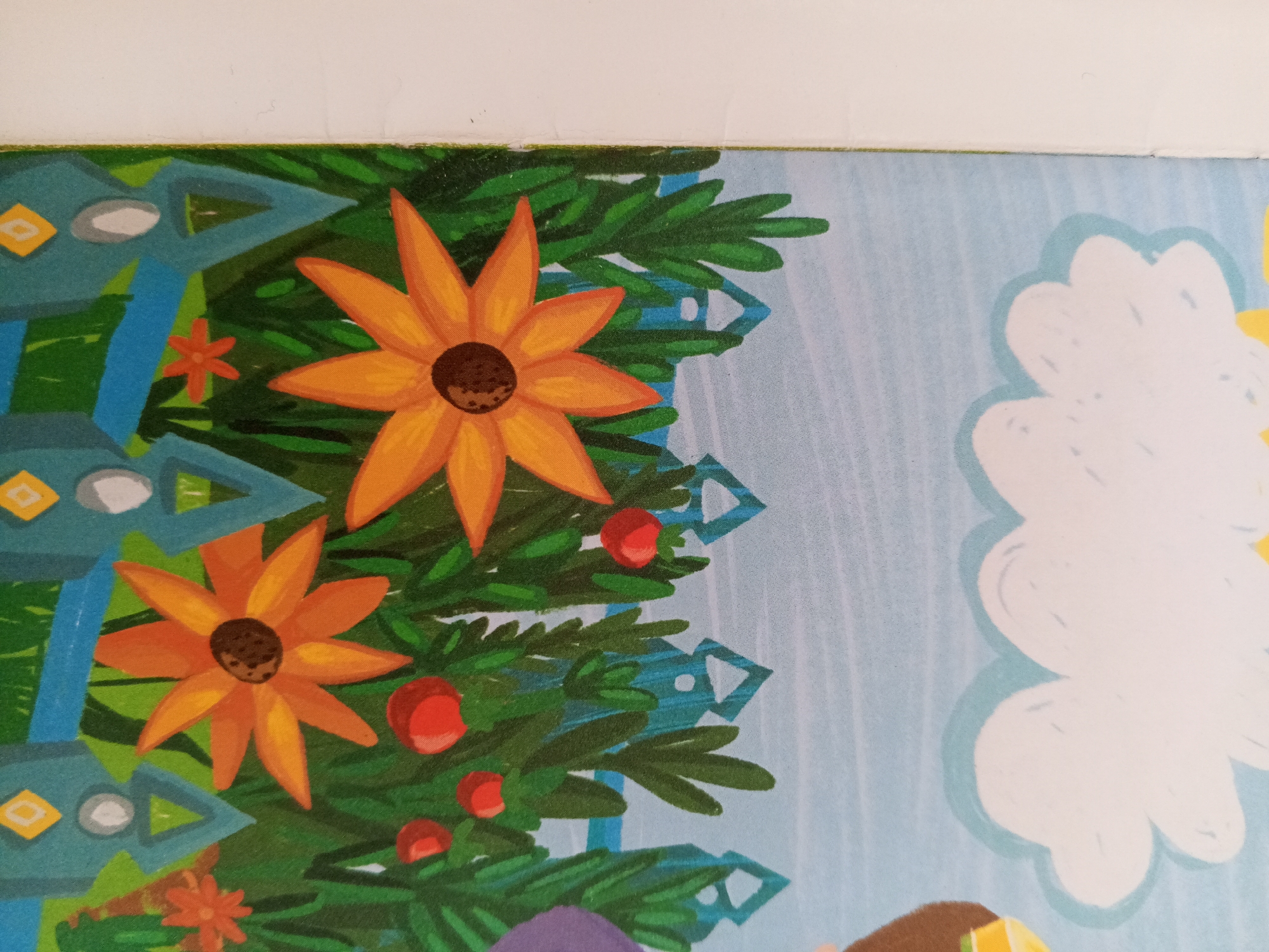 The image shows a close-up, angled view of a colorful illustration, likely from a children's book or wall art. The foreground features two vibrant orange flowers with dark brown centers, resembling sunflowers, nestled amongst dark green, needle-like foliage that suggests a Christmas tree. Scattered amongst the greenery are small, bright red circular objects, which appear to be decorative berries. To the left of the flowers, there is a stylized pattern of blue and teal geometric shapes, including triangles and diamond-like forms, with white and yellow accents. The background is a light blue, patterned with thin, vertical white stripes. On the right side of the image, a large, stylized white cloud with a light blue outline is visible. The overall impression is whimsical and festive. There is no indication of the city of Chistopol, Russia, within the image itself.
