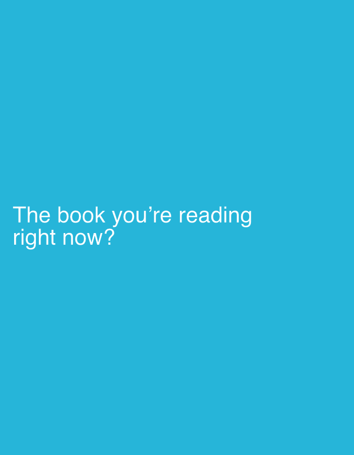 The image is a light blue background with the text "The book you're reading right now?" in white, located in the bottom-left corner. There is no indication of a location in Nivelles, Belgium, or any other city. There are no people, subjects, objects, actions, or interactions visible in the image other than the text itself. The environment is a uniform light blue color.