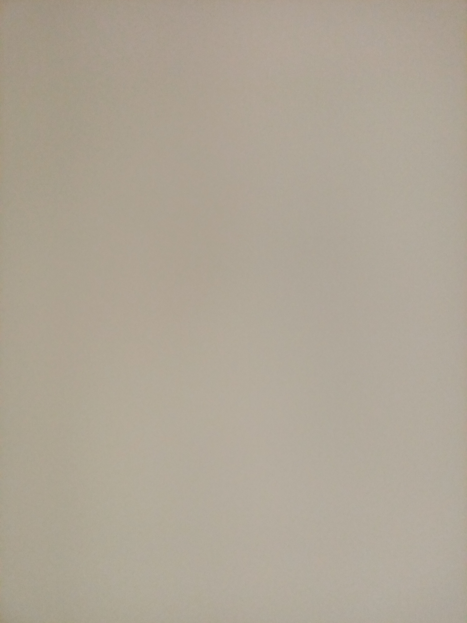 The image is a close-up, evenly lit shot of a textured, beige surface. There are no discernible objects, people, or actions depicted. The surface appears to be a wall or a similar flat expanse. The image offers no information about its location, including the city of Rostov-on-Don, Russia.