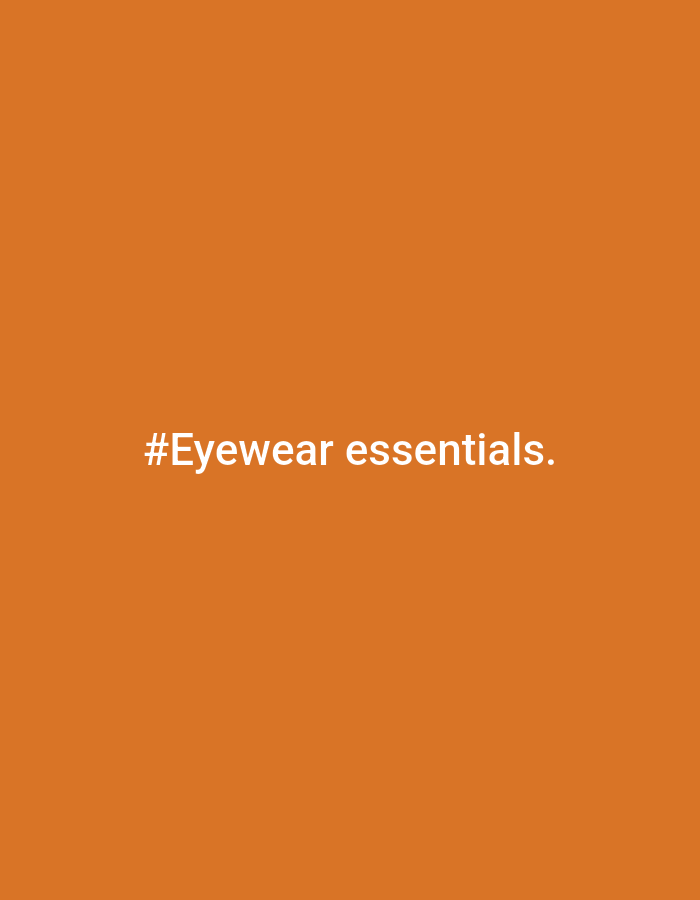 The image is a plain orange background with the white text "#Eyewear essentials." centered.