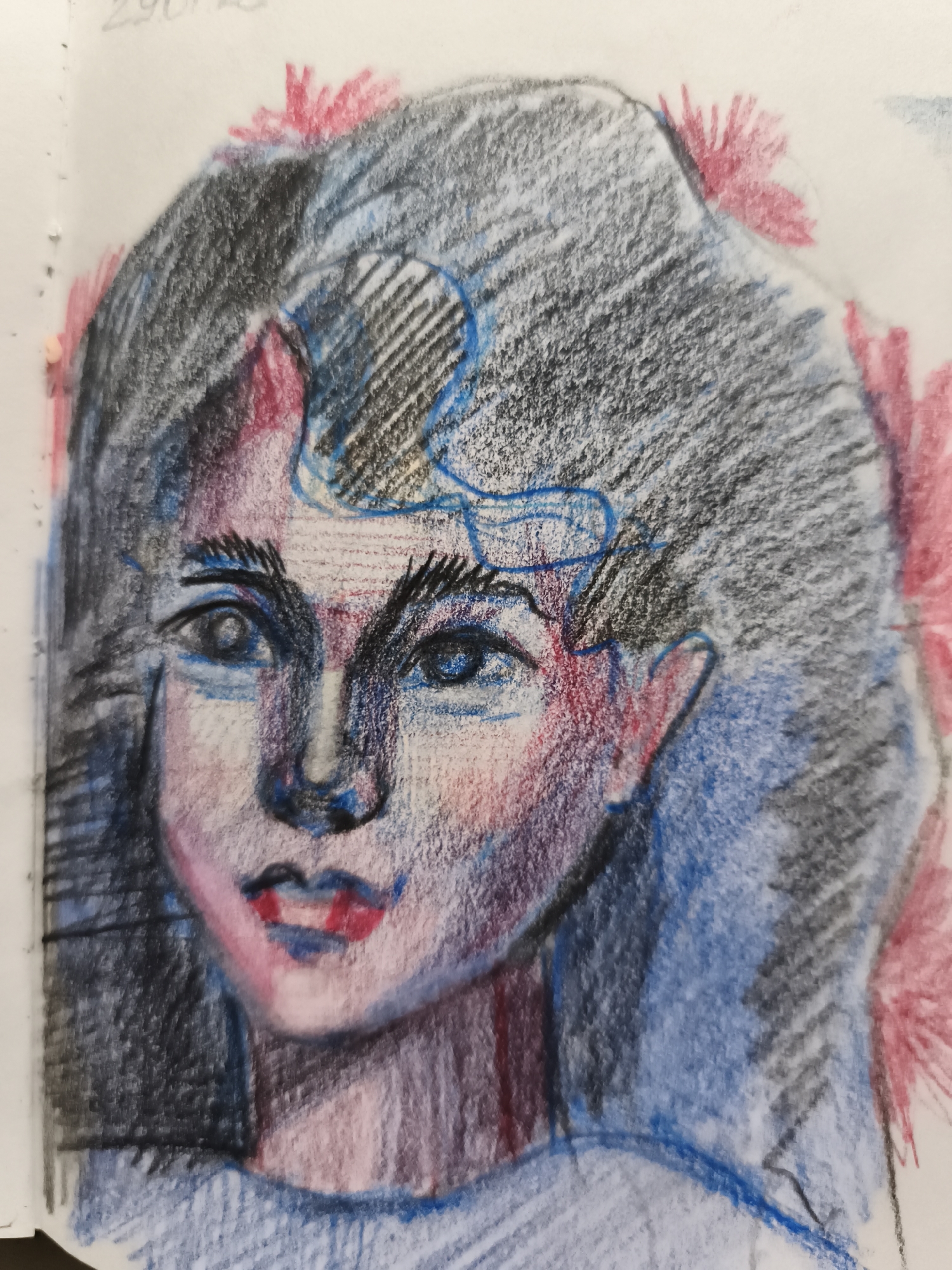 The image is a close-up, colored pencil drawing of a young woman's face, seen from a three-quarter profile. She has dark, voluminous hair with blue accents and pink floral elements around her head. Her eyes are wide and blue, with prominent eyebrows. Her nose is softly rendered, and her lips are a vivid red. The drawing uses a variety of colors, including black, blue, pink, and red, with visible pencil strokes and some smudging. The background is a light, neutral color, suggesting a sketchbook page. There is no discernible location in the city of Saint-Denis, France, in this image.
