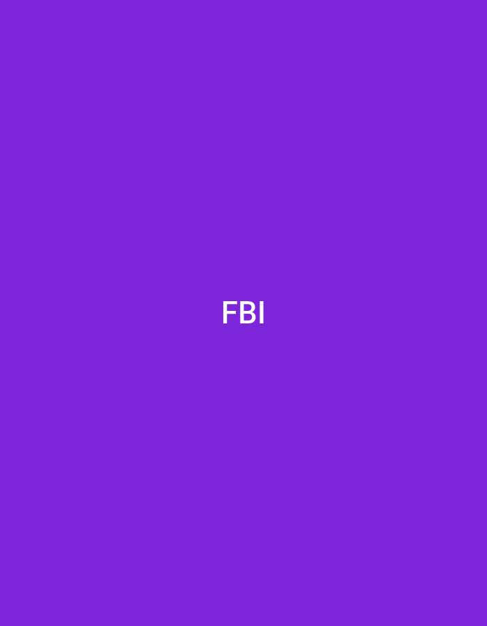 The image displays a solid purple background. Centered horizontally and vertically on this background are the capital letters "FBI" rendered in white. No other subjects, objects, people, actions, interactions, or environmental details are discernible within the image. The visual content provides no information to determine a specific geographical location, including the city of Casablanca, Morocco.