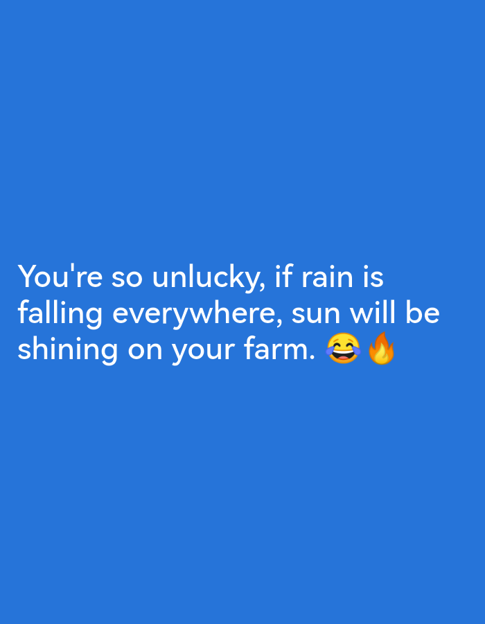The image is a TikTok video with a blue background. White text overlays the screen, reading: "You're so unlucky, if rain is falling everywhere, sun will be shining on your farm." Two emojis, a laughing face and a fire emoji, are positioned at the end of the text. There are no people, subjects, or objects present other than the text and emojis. The scene is entirely digital, with no discernible city or environmental context.