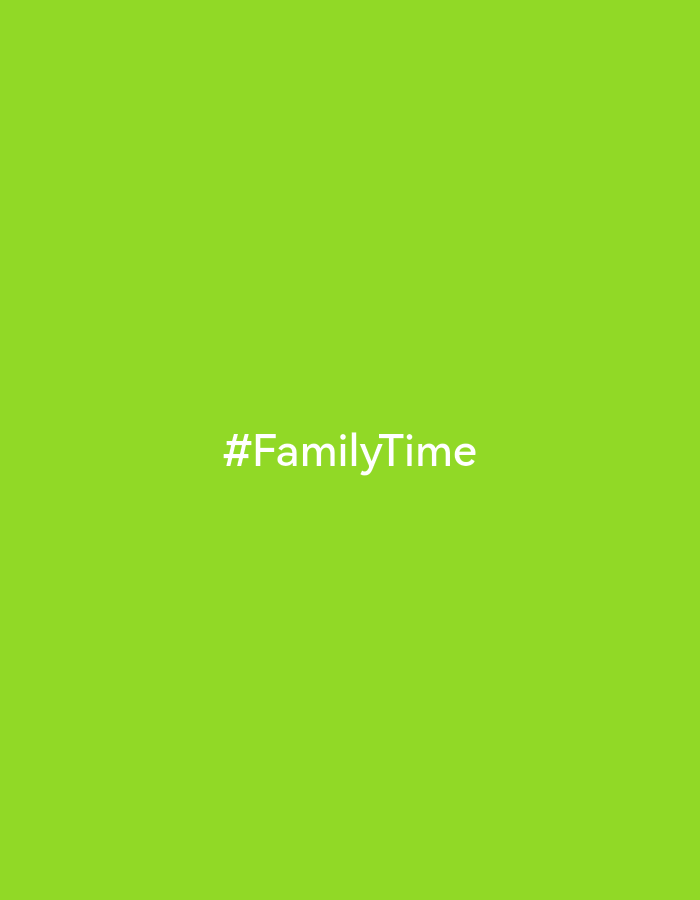 The image is a green background with the white text "#FamilyTime" centered on the image. The location is not apparent from the image.