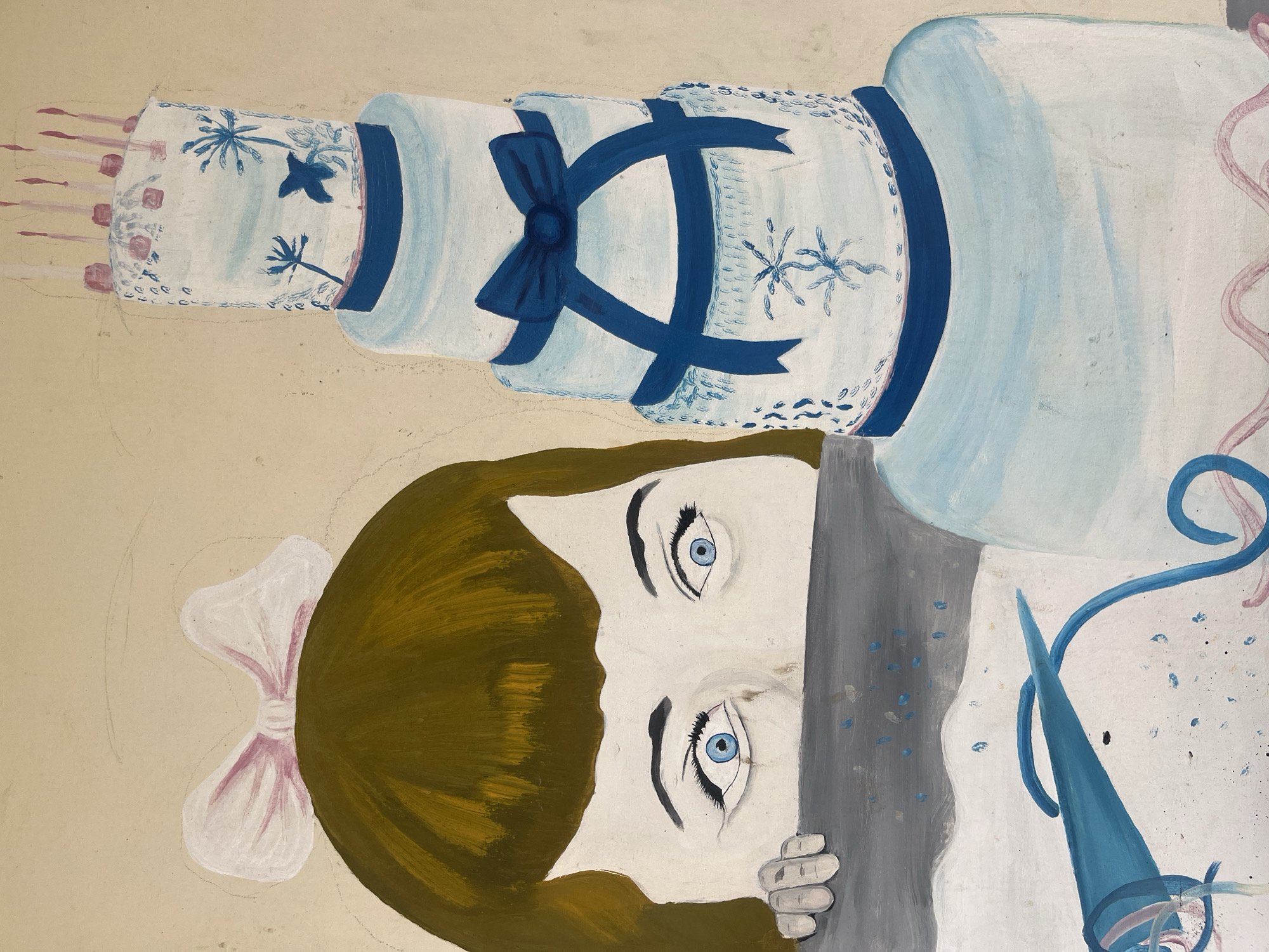 This is a painting, likely an illustration or part of a larger artwork, featuring a stylized representation of a multi-tiered cake and a person's face. The cake is predominantly white with blue decorative elements, including ribbons, bows, and what appear to be floral or palm leaf motifs. It has several layers, and the top layer is adorned with pink stick-like shapes, possibly candles or decorations.
The lower portion of the image reveals a person's face, depicted in a somewhat surreal or abstract style. The person has prominent blue eyes with defined eyelashes and dark eyebrows. Their hair is a rich brown color. The face is positioned such that the eyes are looking upwards, and the lower part of the face is obscured by a gray surface, which the person's hand is grasping. The hand is rendered with simplified fingers. To the left of the face, a light pink bow is visible, possibly attached to the person's hair or clothing.
The overall aesthetic is painterly, with visible brushstrokes and a somewhat unfinished quality in some areas, indicated by faint sketched lines. The background is a neutral, light beige color. There are scattered specks of blue and pink paint, adding a sense of texture and perhaps dynamism to the composition. The style suggests a whimsical or dreamlike quality. The context of Gura Top, Nigeria, does not provide direct visual cues within the image itself, but it establishes the geographical location of the artwork's origin or subject matter. No text is visible in the image.