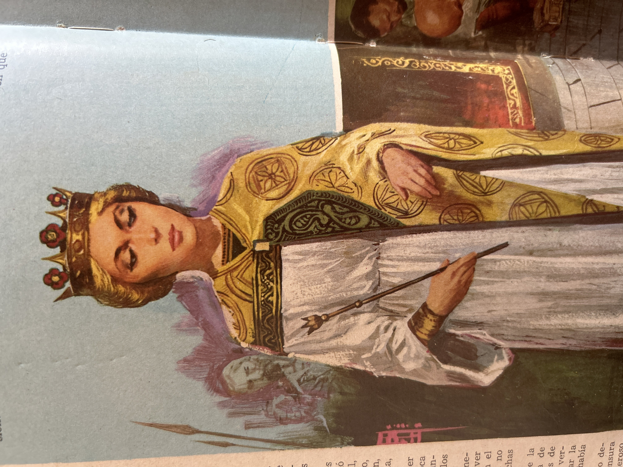 This is an illustration of a woman wearing a crown and ornate robes, holding a scepter. She is depicted in a formal pose, with her gaze cast downward. In the background, there are faint figures of other people and architectural elements. To the left of the main subject, text in a foreign language is visible. The image appears to be a page from a book or magazine, with visible binding and page edges. There is no information within the image or its context to suggest any connection to Santa Ana, Venezuela.