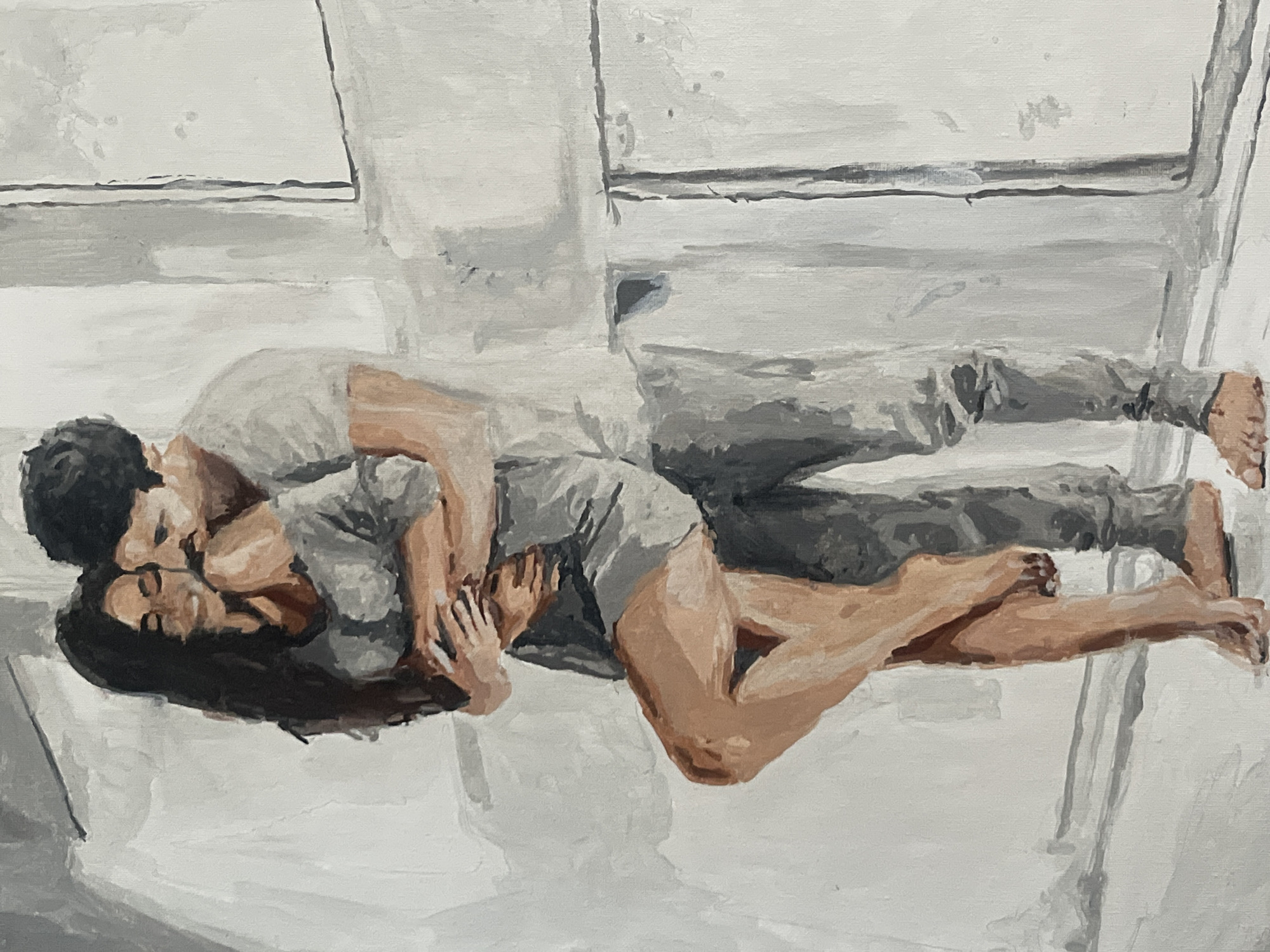 A painting depicts a couple embracing in a dimly lit room with white walls. The man, with dark hair and a mustache, wears a light-colored t-shirt and grey pants. He is holding the woman from behind, with his face nestled against her neck. The woman has long dark hair and wears a grey dress. Her eyes are closed, and her head is tilted back. Her left leg is bent and crosses in front of her right leg, which is slightly lifted. Both are barefoot. The background consists of abstract white and grey shapes suggesting windows or walls. The style is Impressionistic with visible brushstrokes. There is no indication of the city of Rybnitsa, Moldova, in this artwork.