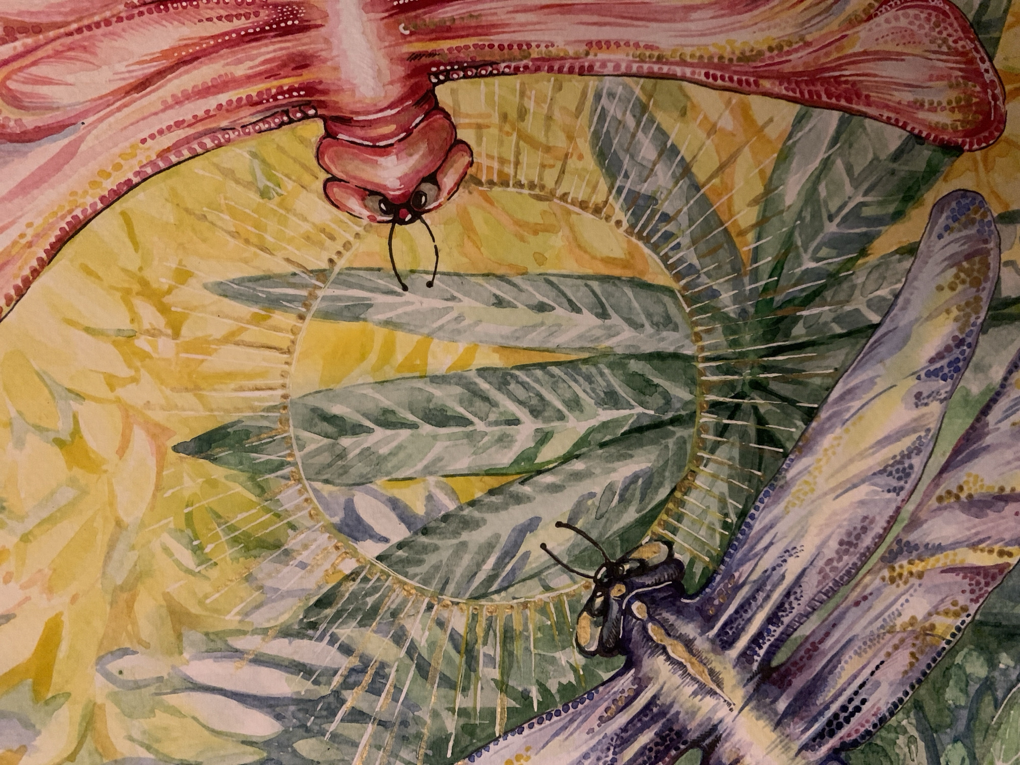 The image is a watercolor painting featuring two dragonflies. One is red and positioned at the top, with its head facing downwards. The other is blue and purple, located on the bottom right. Both dragonflies are depicted within a circular frame of radiating lines. The background is a mix of green leaves and yellow hues. The scene does not appear to be in Fethiye, Turkey; it is an artistic rendering.