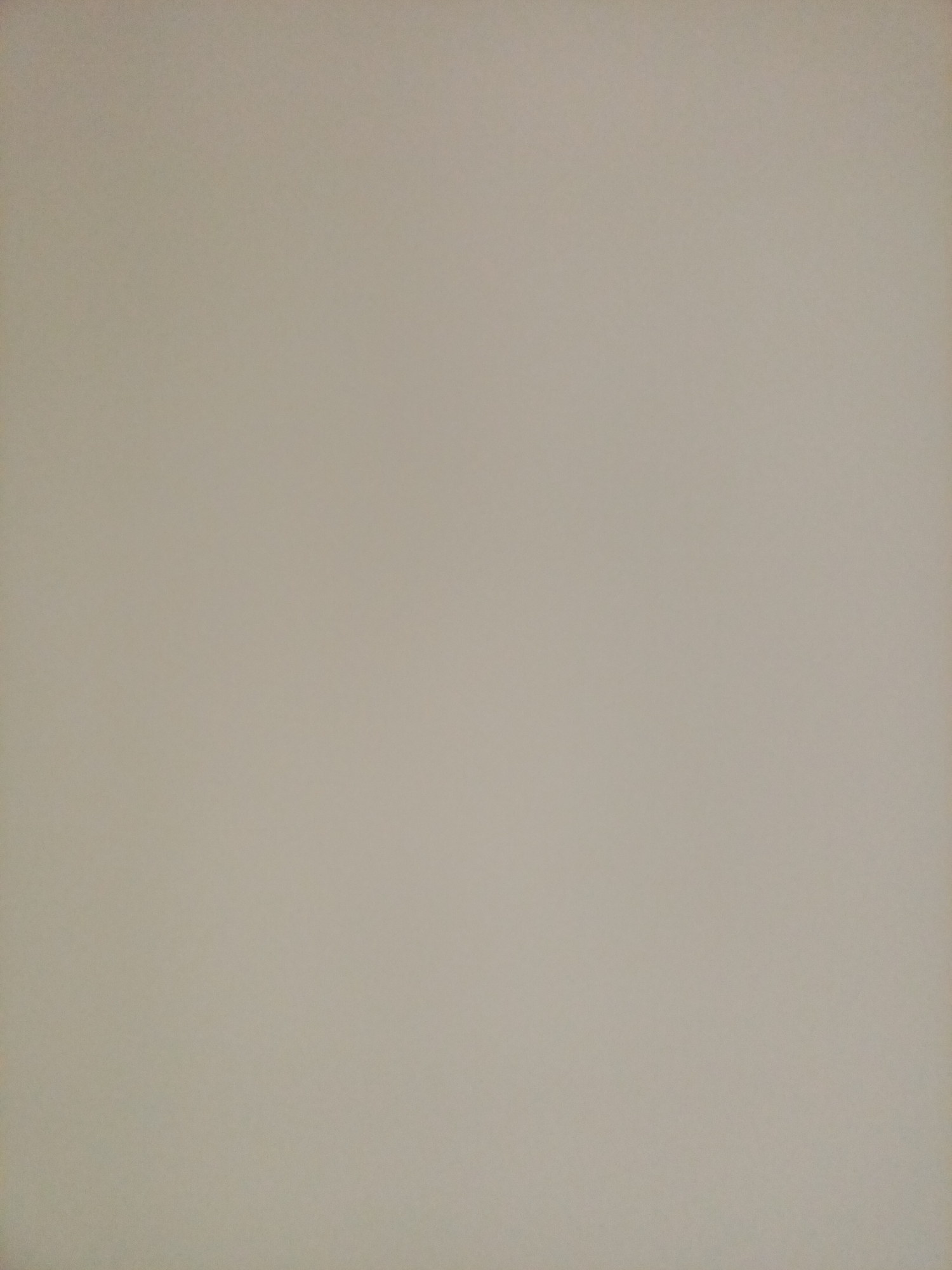The image is a plain, light grey background. There are no discernible objects, people, or actions within the frame. The lighting is even, with no distinct shadows or highlights. The texture of the surface appears to be slightly grainy. There is no information available to associate this image with the city of Rostov-on-Don, Russia.