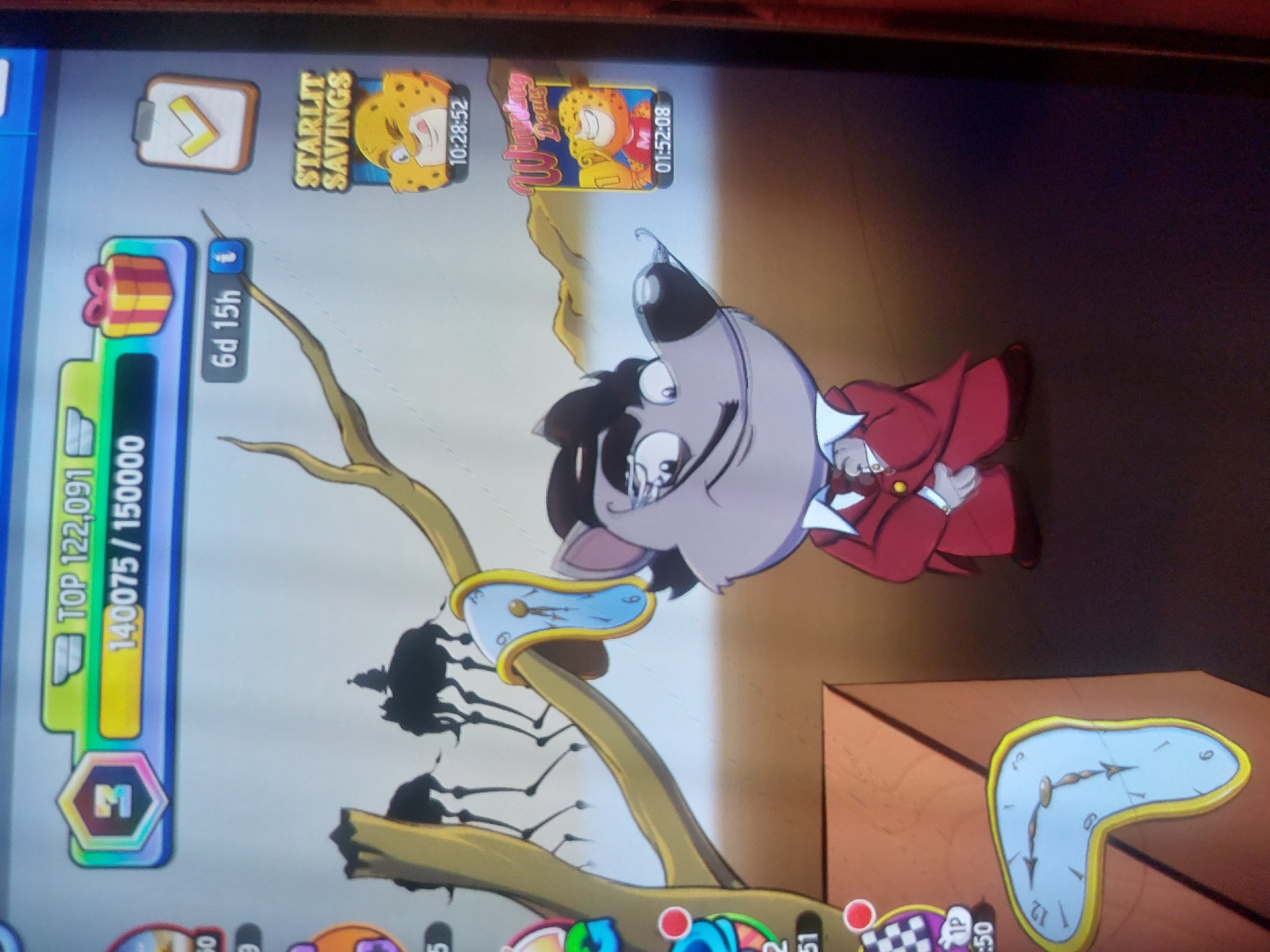 The image shows a mobile game screen with a cartoon character resembling a wolf or dog wearing a red suit. The game's interface displays "TOP 122,091" with a progress bar of "140075/150000." There are time-limited events labeled "STARLIT SAVINGS" and "Winning Deals." A Salvador Dali-esque melting clock is depicted as part of the game's graphics, hanging from a tree branch and lying on a surface. There is no indication this image is linked to Tsarevo, Bulgaria.