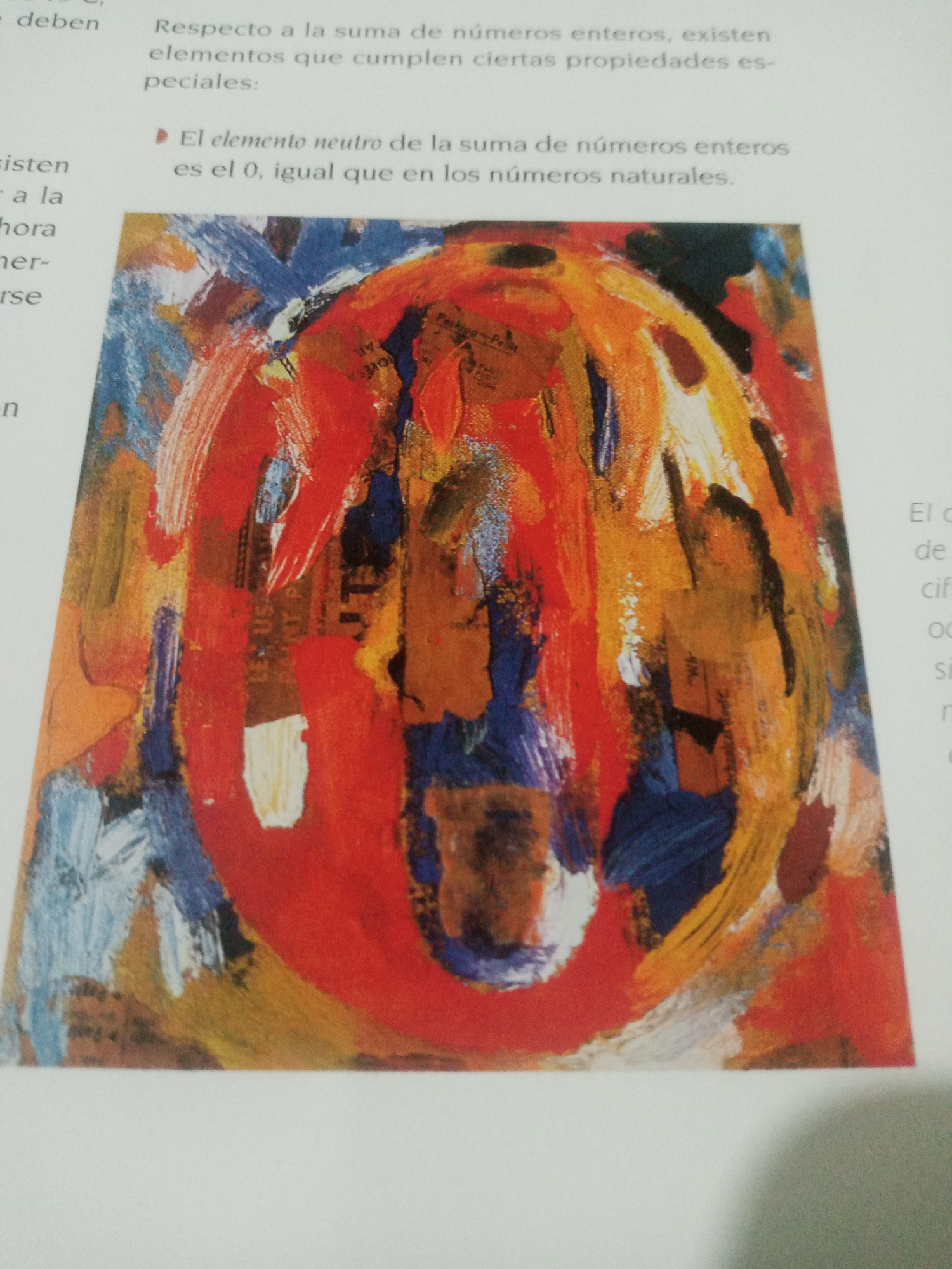 The image displays a colorful abstract painting of the number zero, with bold brushstrokes in shades of red, orange, yellow, blue, and white. The painting is set against a white background with text in Spanish to the left and right. The text discusses mathematical concepts related to integers and natural numbers, specifically mentioning the additive identity. The painting is likely a visual aid or illustration accompanying the text. There is no visible indication of the city of Santa Ana, Venezuela, nor any environmental details that would suggest a specific location.