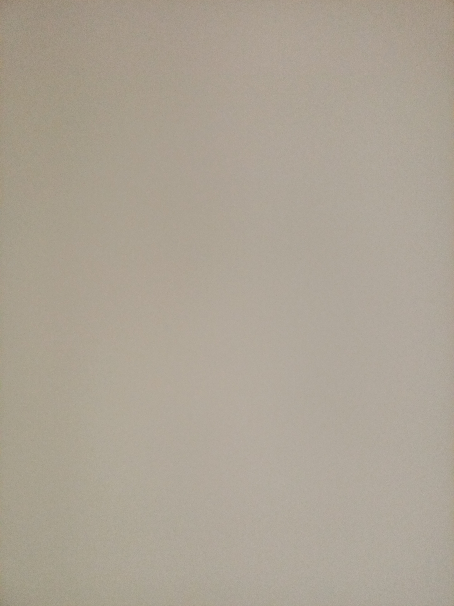 The image is a plain, unadorned wall. There are no discernable objects, people, or actions taking place. The wall appears to be a neutral beige color and shows no visible markings, damage, or textures. The lighting is even, suggesting an indoor environment or a uniformly lit outdoor space. There are no indicators to suggest a specific location within Rostov-on-Don, Russia or any other city.