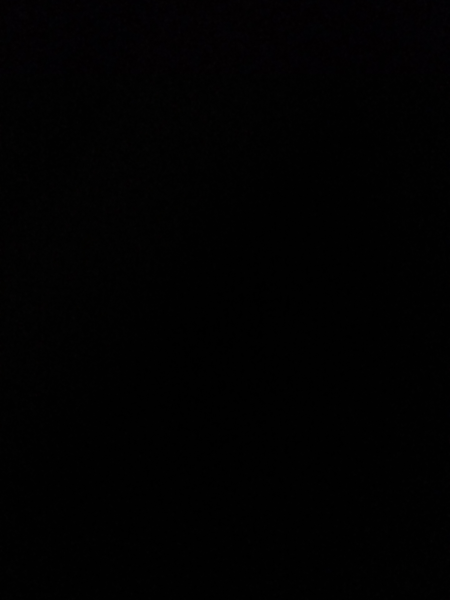 The image is a black square. There are no discernible people, subjects, objects, actions, interactions, or environmental details present.