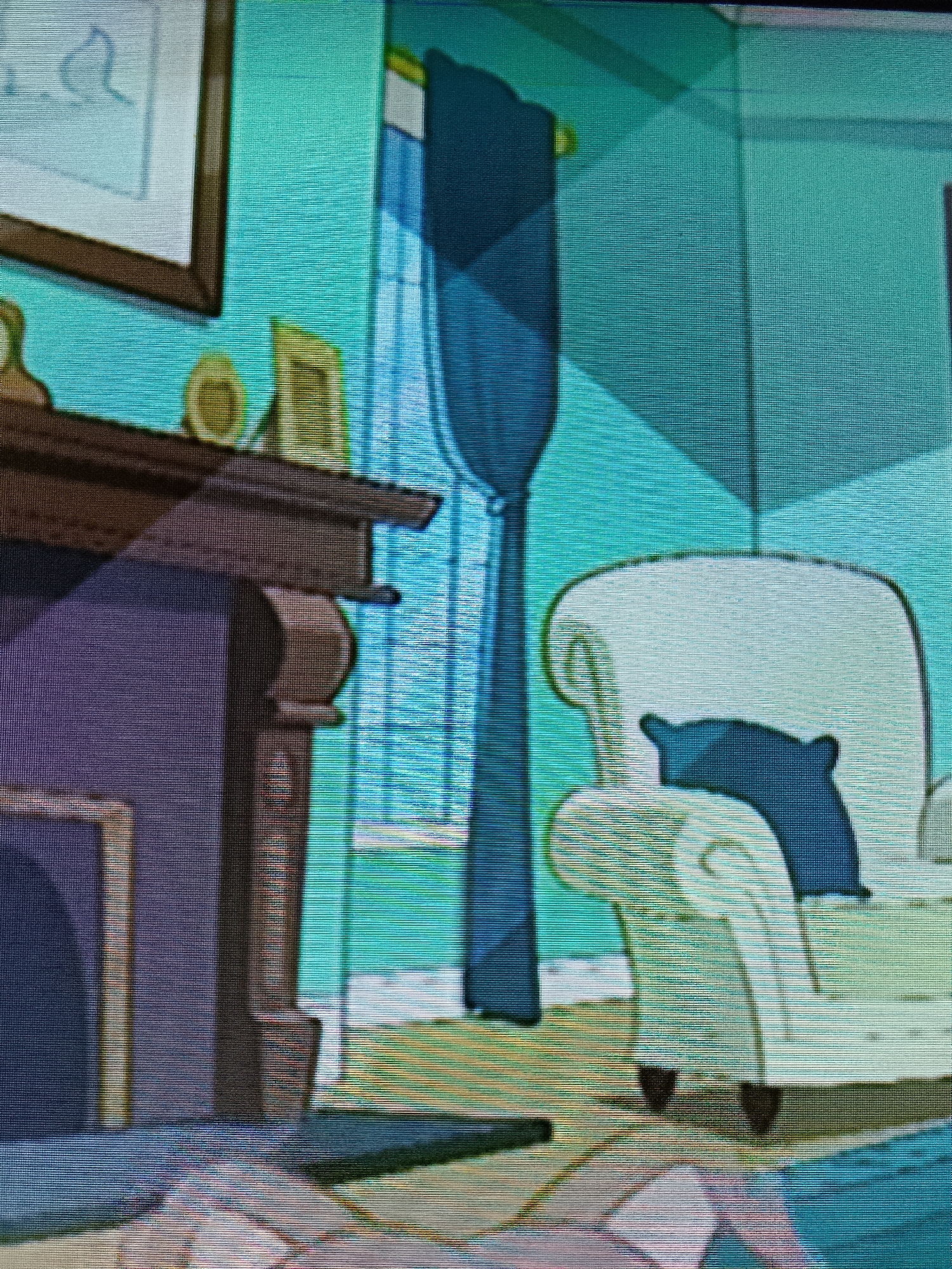 The image shows an interior scene of a room with a fireplace on the left and a chair on the right. The walls are painted a teal color, and there is a window with blue curtains in the background. The fireplace is made of dark wood and has a purple firebox. A dark blue pillow is on the chair. The floor is covered with a light-colored rug with a geometric pattern. There are framed pictures on the wall above the fireplace. The scene appears to be a domestic setting. The location in Merbopuntong, Indonesia, is not evident from the image.