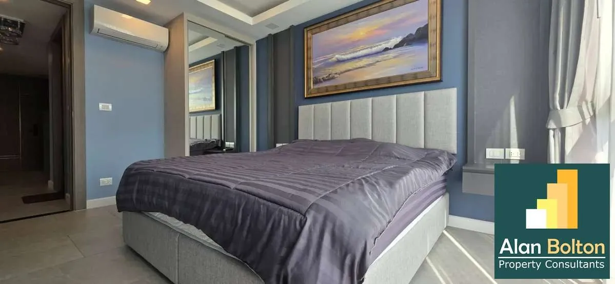 Modern 3-Bedroom Condo at Serenity Residence Jomtien | Pool View photo 12