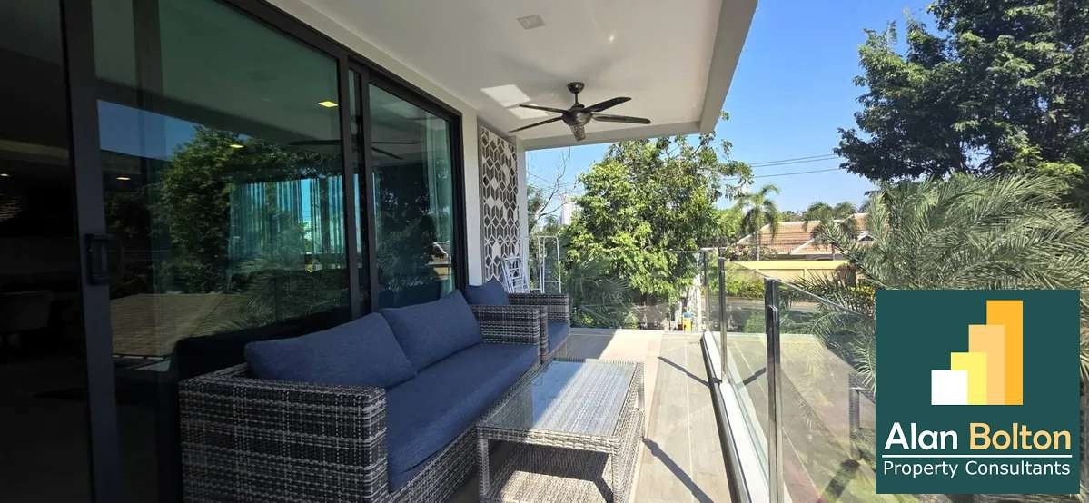 Modern 3-Bedroom Condo at Serenity Residence Jomtien | Pool View photo 11